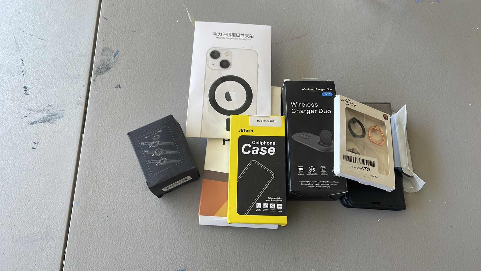 Photo 1 of BOX OF PHONE ACCESSORIES