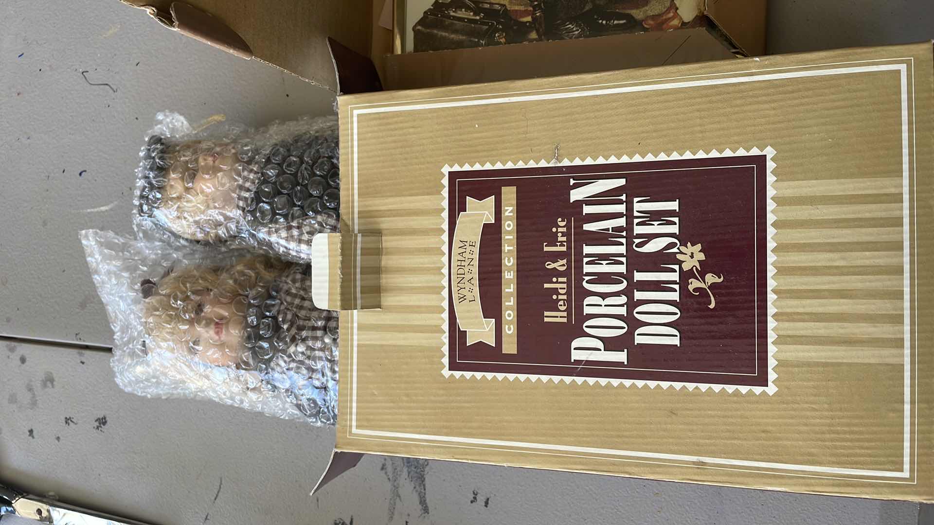 Photo 2 of NORMAN ROCKWELL PRINTS AND PORCELAIN DOLLS