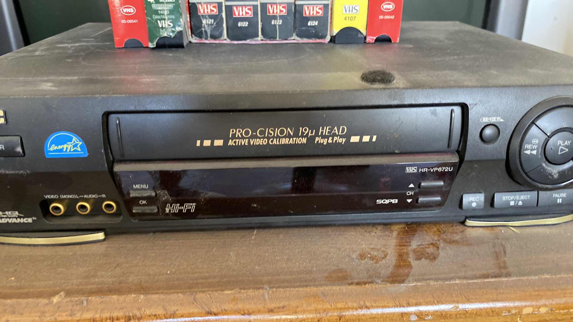 Photo 1 of JVC VCR AND ASSORTED ACTION MOVIES