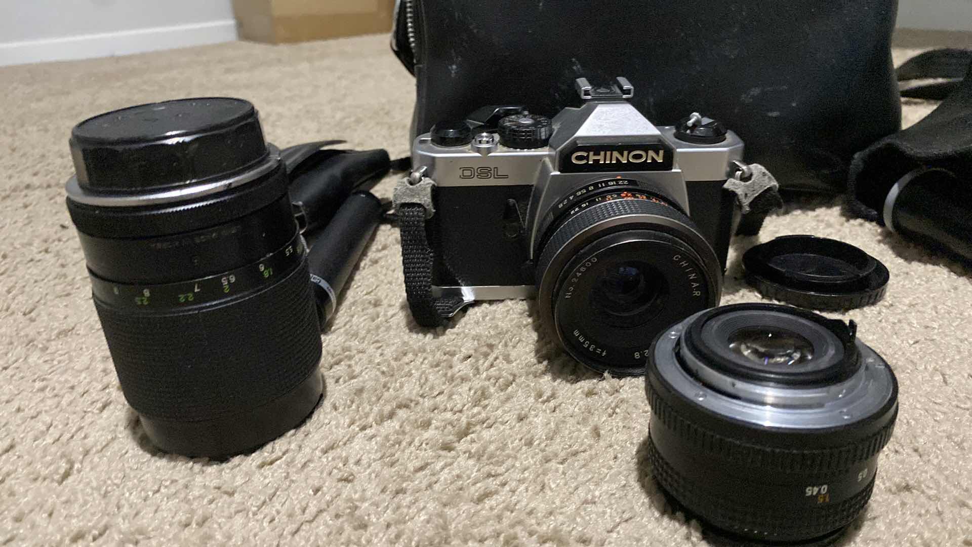 Photo 1 of VINTAGE CHINON 35mm CAMERA WITH ADDITIONAL LENS ACCESSORIES AND BAG