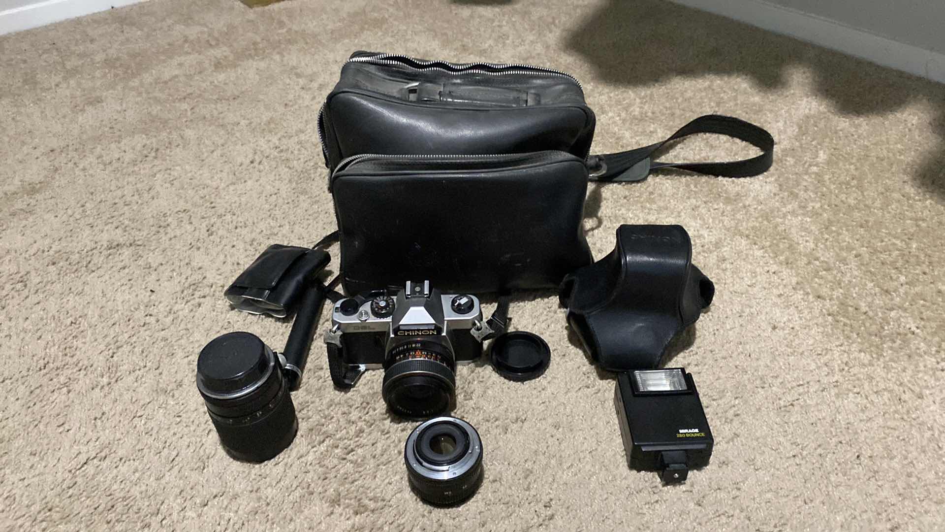 Photo 1 of VINTAGE CHINON 35mm CAMERA WITH ADDITIONAL LENS ACCESSORIES AND BAG