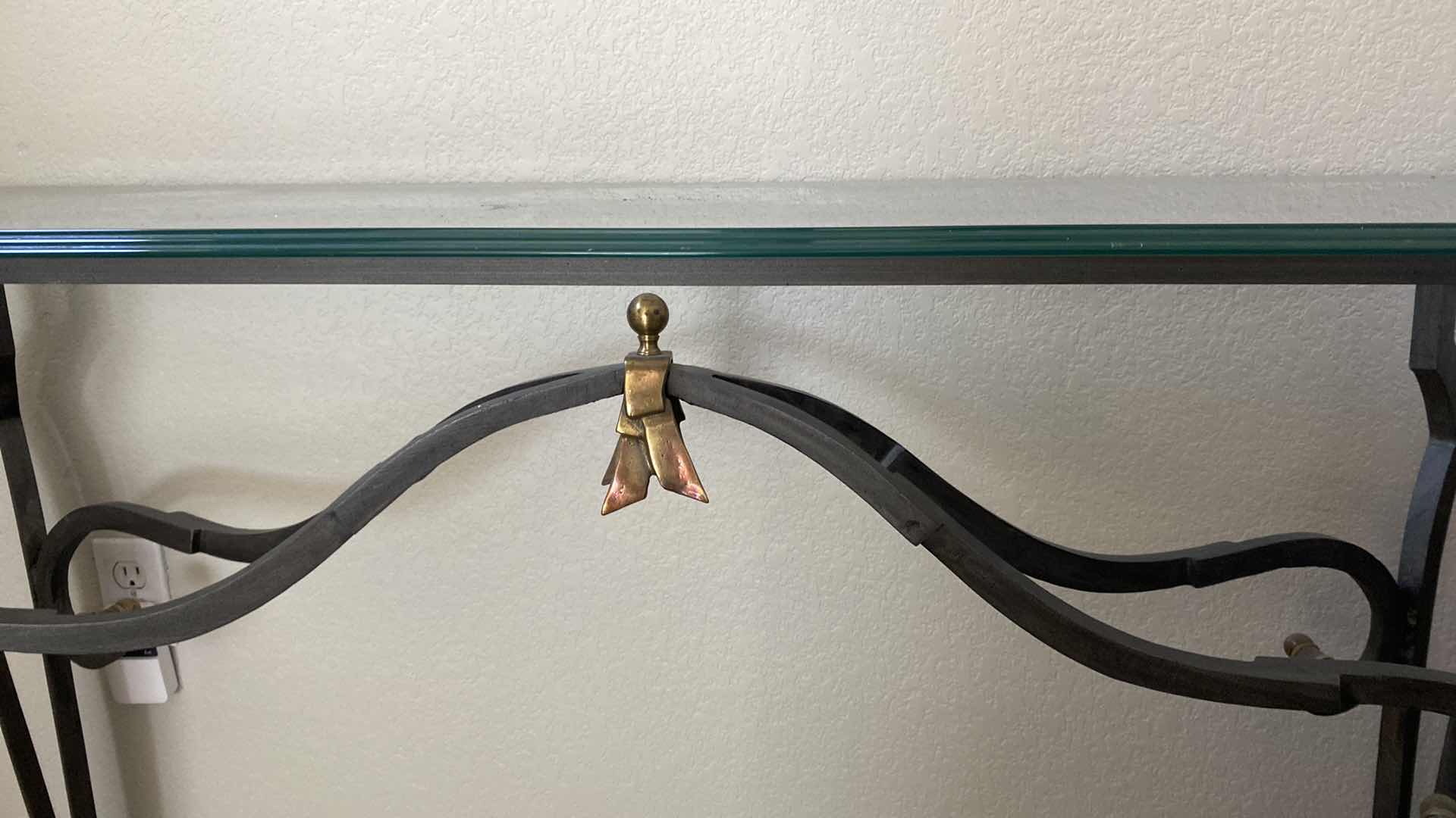 Photo 1 of BEVELED GLASS AND IRON SOFA TABLE 56“ x 17.5” x H 29”