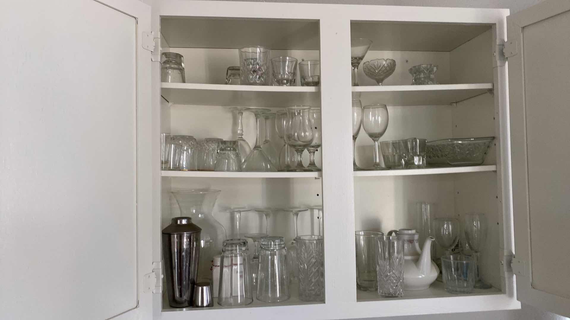Photo 1 of CONTENTS OF KITCHEN CABINET GLASSWARE AND BARWARE