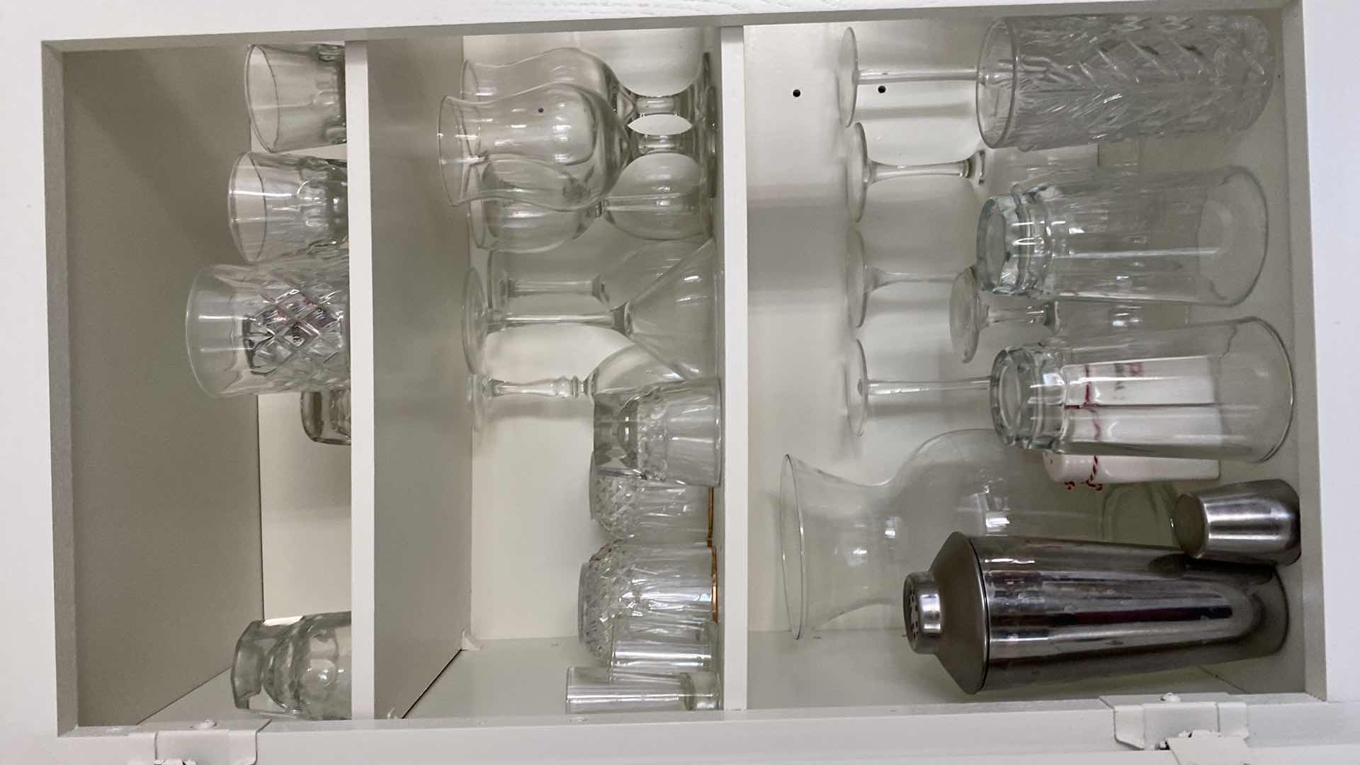 Photo 1 of CONTENTS OF KITCHEN CABINET GLASSWARE AND BARWARE