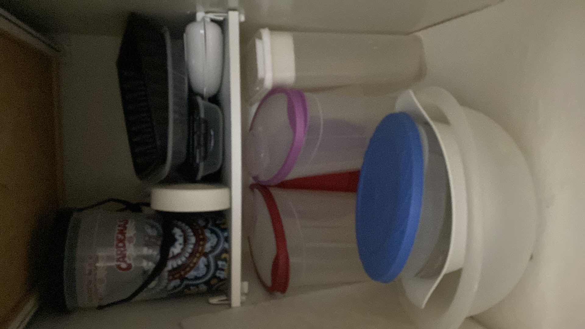 Photo 1 of CONTENTS OF KITCHEN CABINET PLASTICWARE CUTTING BOARD