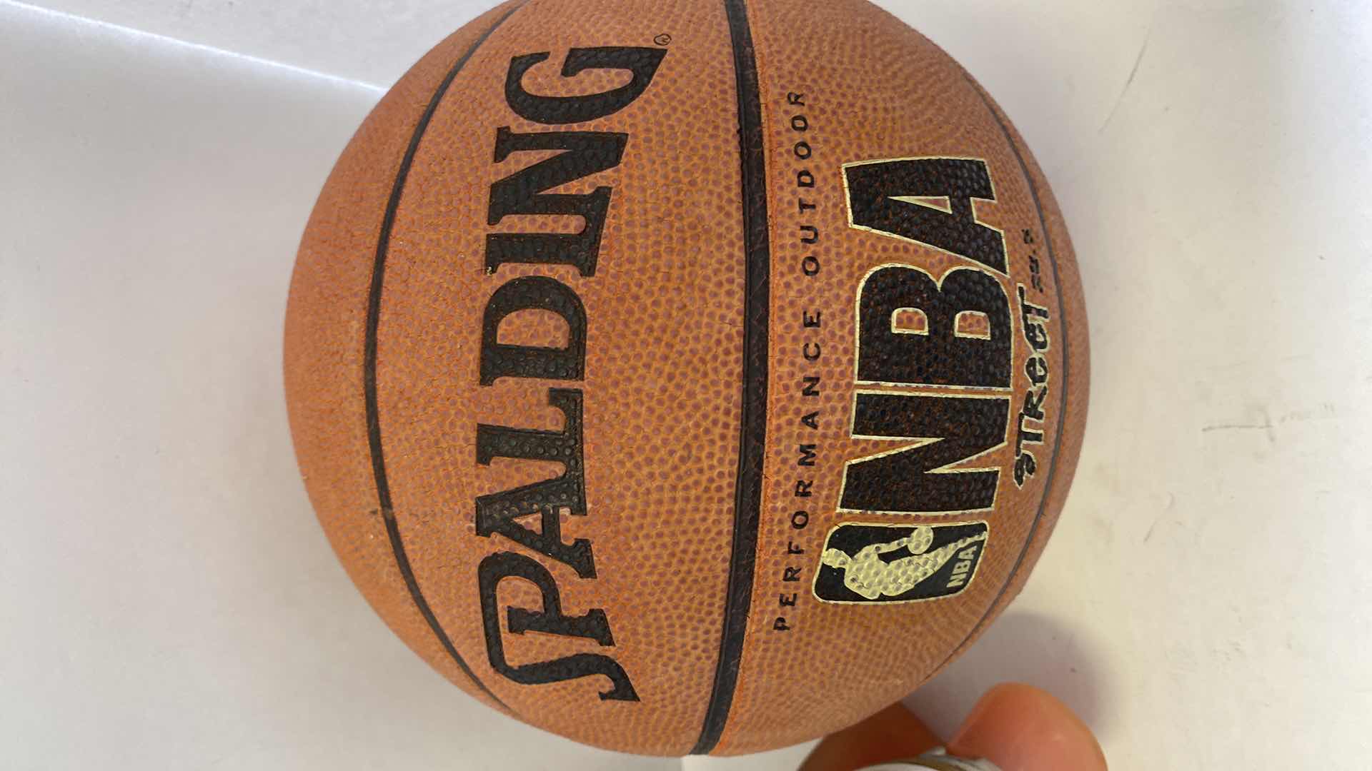 Photo 1 of LADIES SIZE 3 SKATES, SIZE 7 BOOTS AND CLEATS SPALDING BASKETBALL