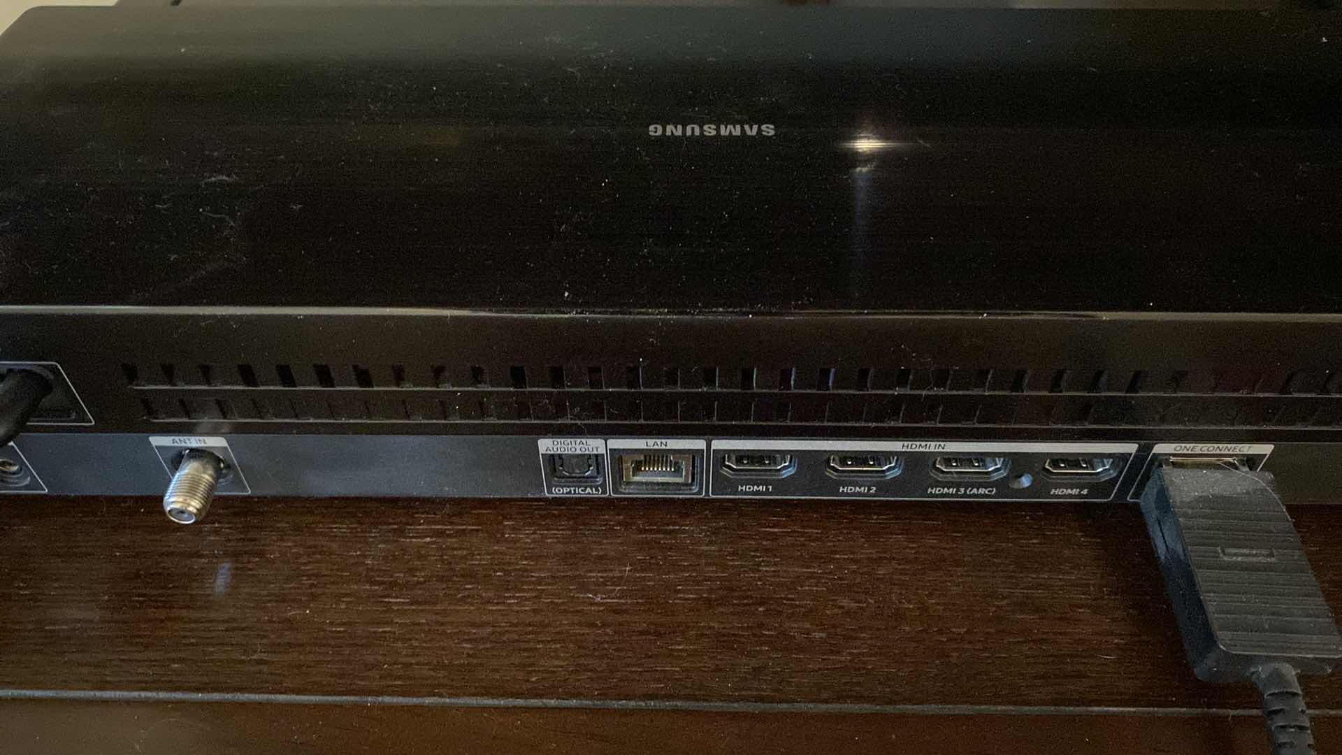 Photo 1 of SAMSUNG 65” TV WITH ROKU AND REMOTES