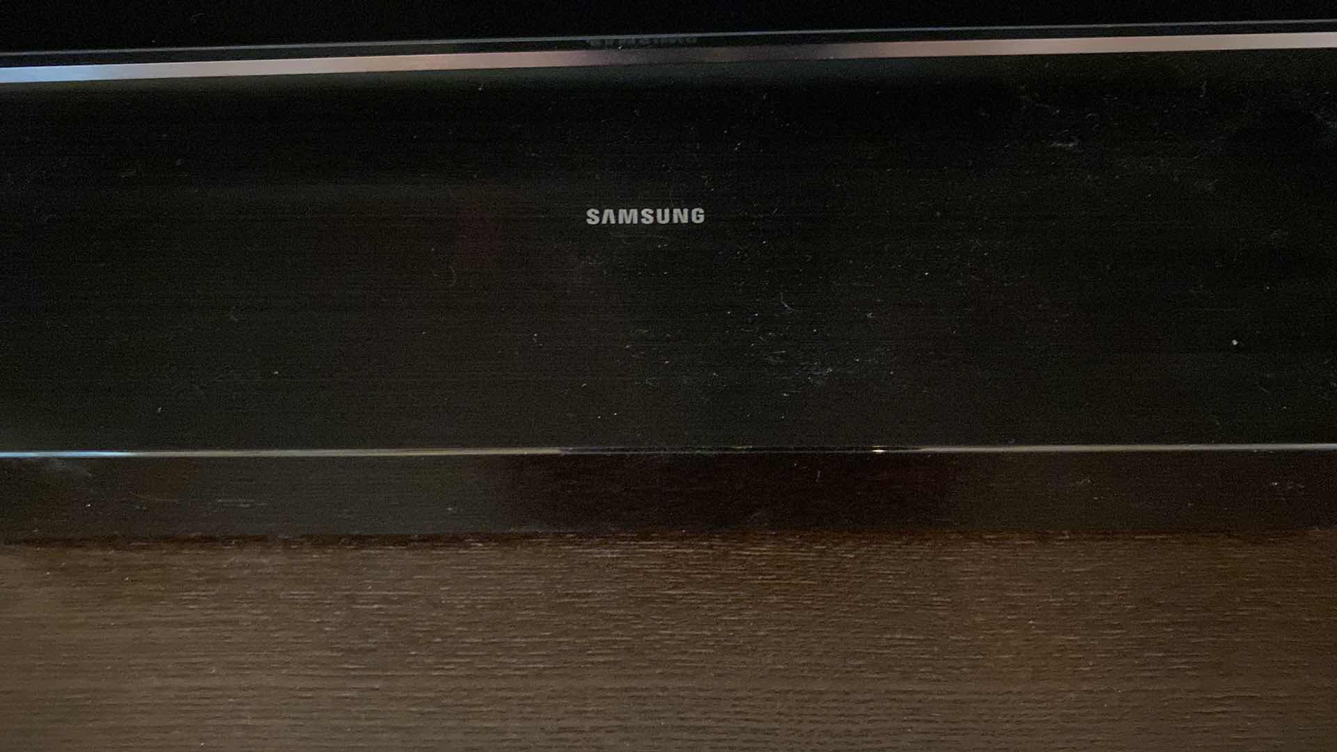 Photo 1 of SAMSUNG 65” TV WITH ROKU AND REMOTES