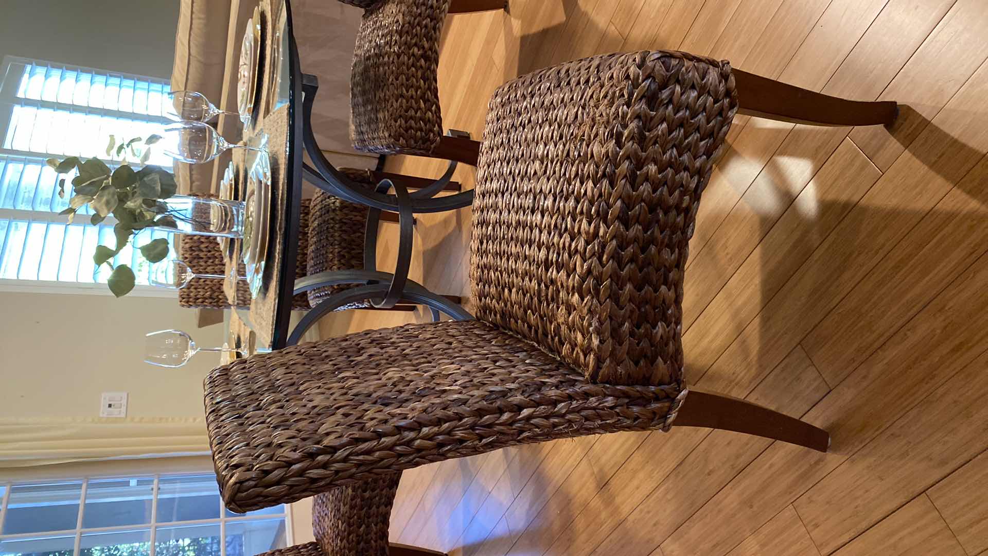 Photo 1 of GLASS TOP METAL DINING TABLE WITH 4 WEAVED CHAIRS 51” X H 30”