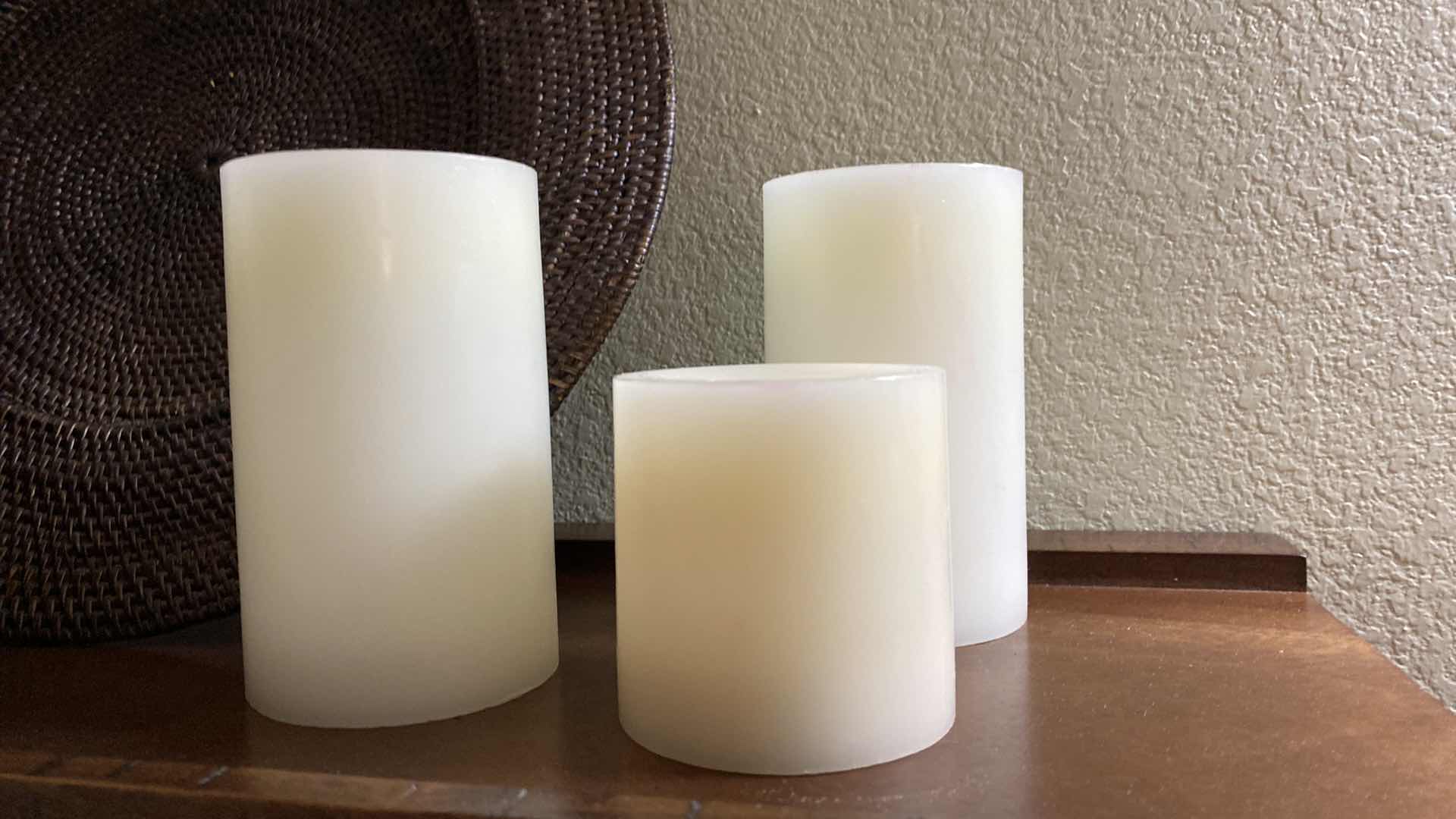 Photo 3 of 3 FLAMELESS CANDLES, FISH 12“ x 5 1/2“ AND WOVEN CHARGE CHARGER