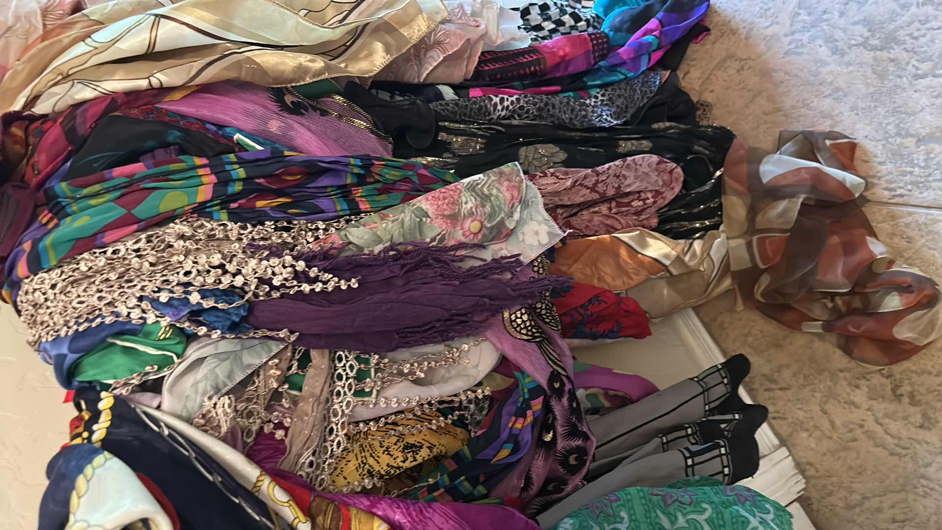 Photo 1 of BOTTOM RACK OF SCARVES