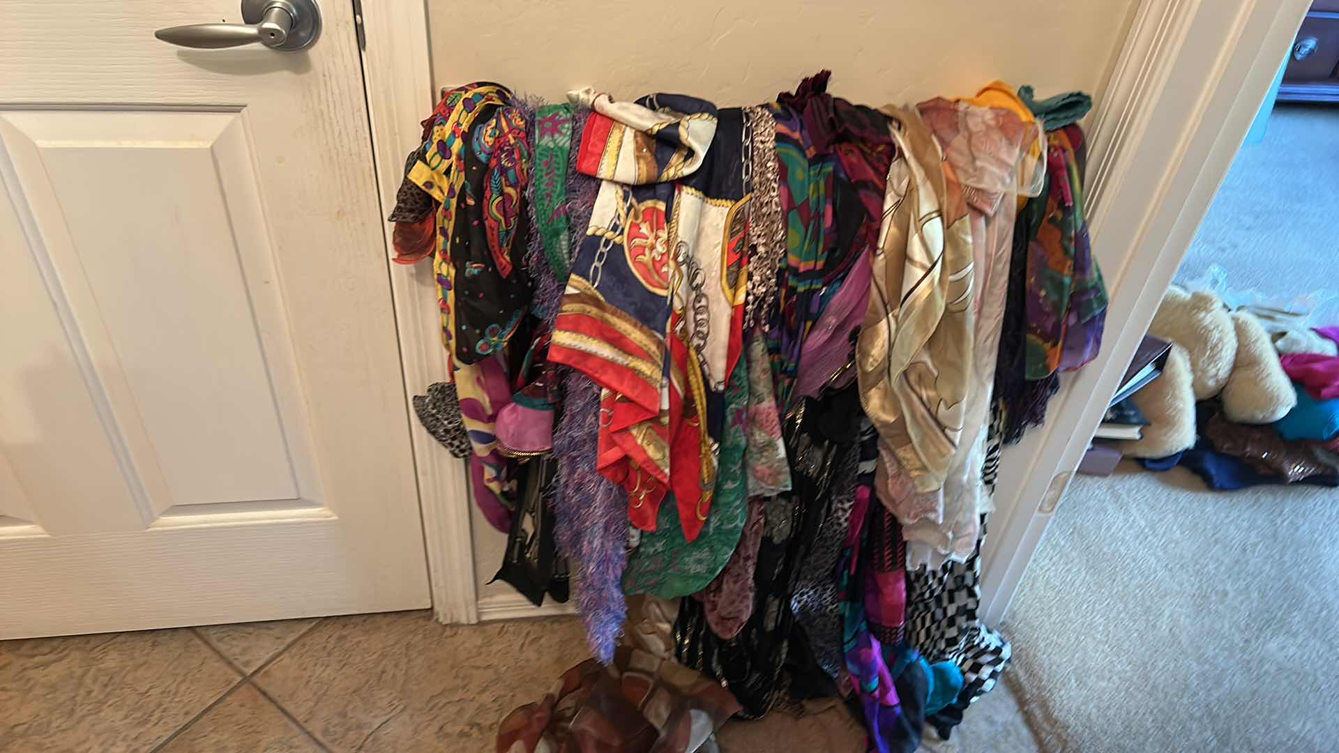 Photo 1 of BOTTOM RACK OF SCARVES