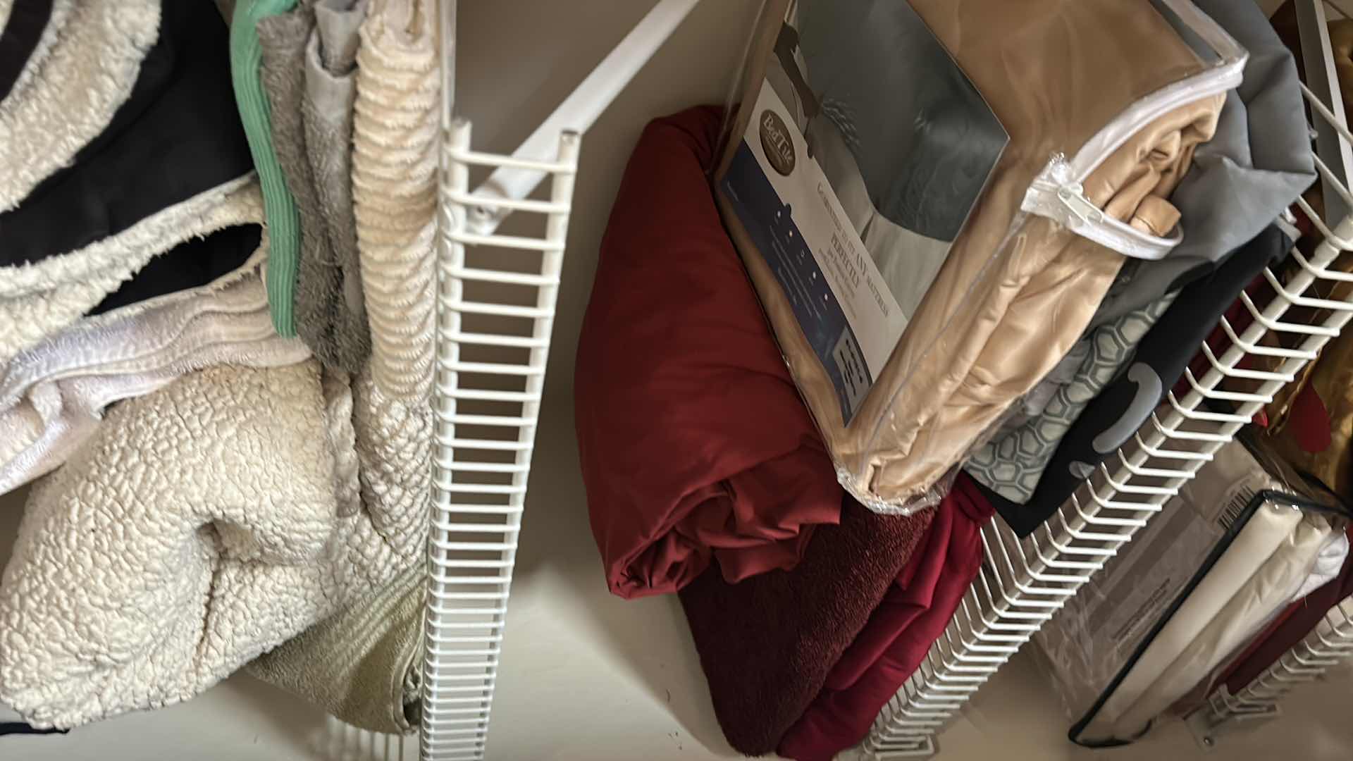 Photo 1 of LINENS - CONTENTS OF LEFT SIDE OF CLOSET