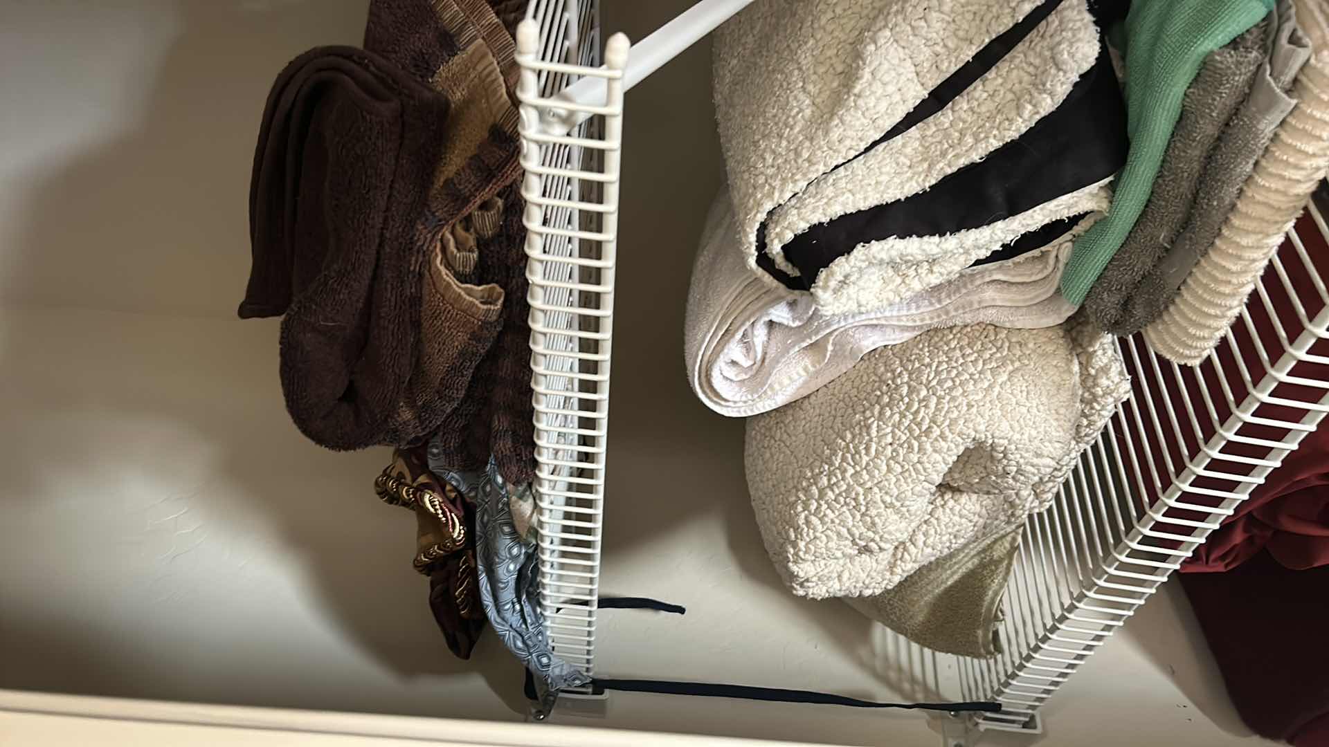 Photo 1 of LINENS - CONTENTS OF LEFT SIDE OF CLOSET