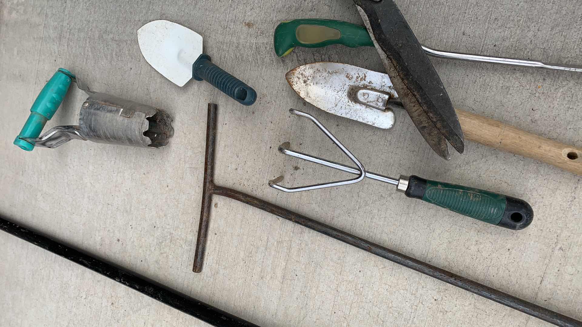 Photo 1 of GARDEN TOOLS AND A BROOM
