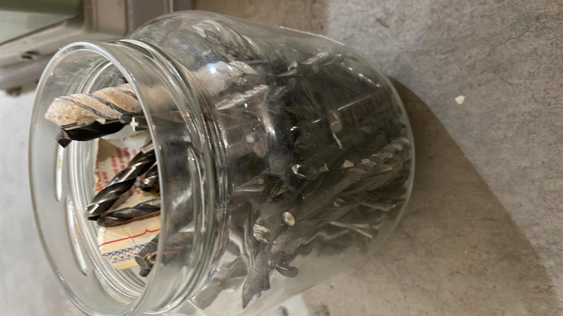 Photo 1 of JAR FULL OF DRILL BITS. MANY SIZES