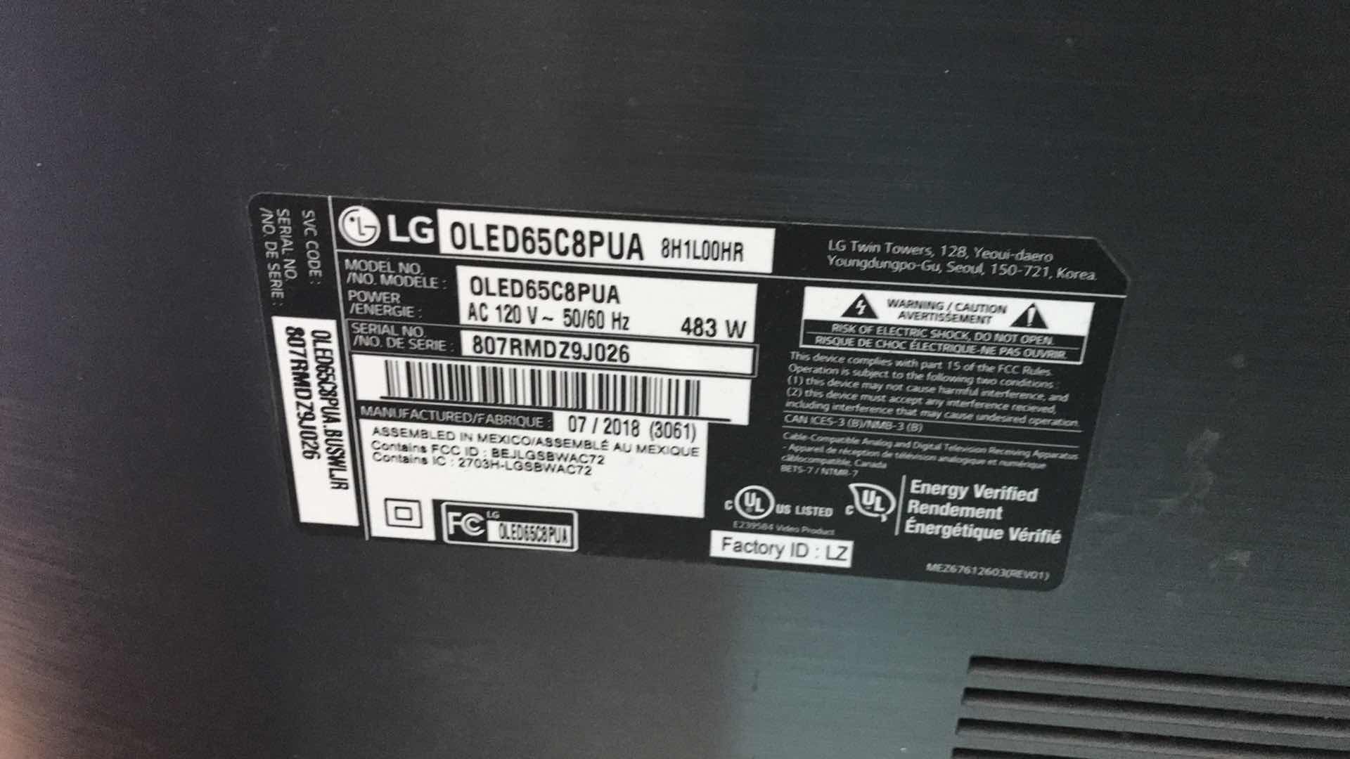 Photo 1 of LG 65” FLAT SCREEN TV W/ REMOTE 