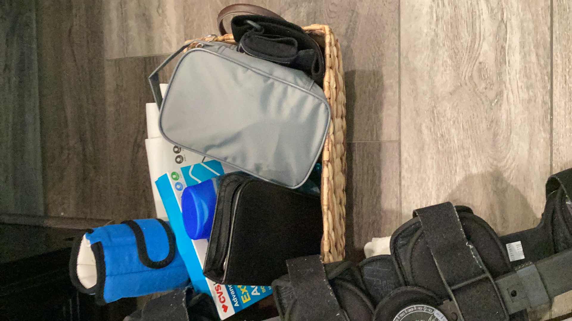 Photo 1 of PERSONAL MEDICAL SUPPLIES INCLUDING BRACES, GRIP BARS, HEATING PAD, BANDAGES, AND SOAP.