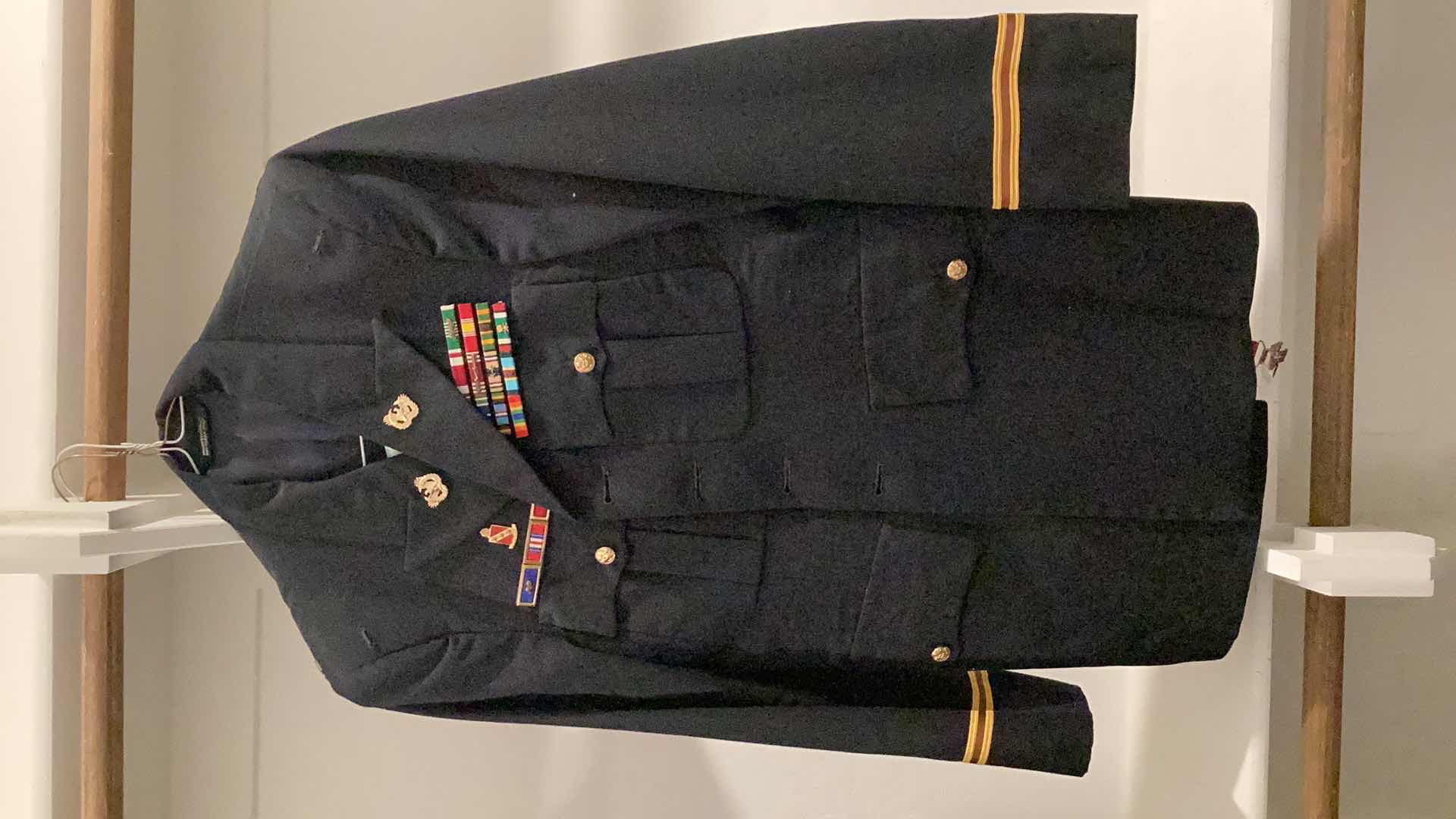 Photo 1 of AUTHENTIC MILITARY DRESS SUITE WITH BADGES AND SUSPENDERS.