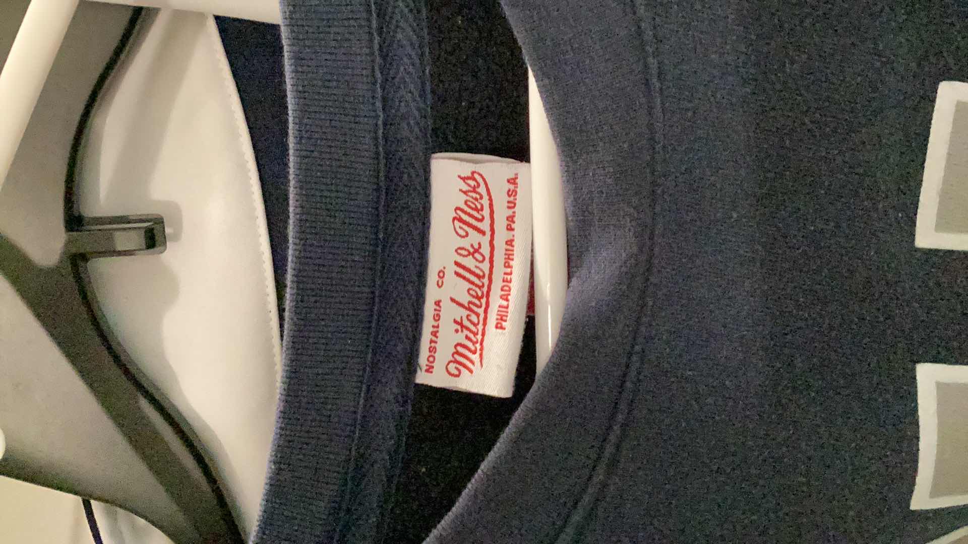 Photo 1 of DALLAS COWBOYS JACKET AND OTHER MERCHANDISE 3 PAIR SIZES VARY FROM L TO XL.