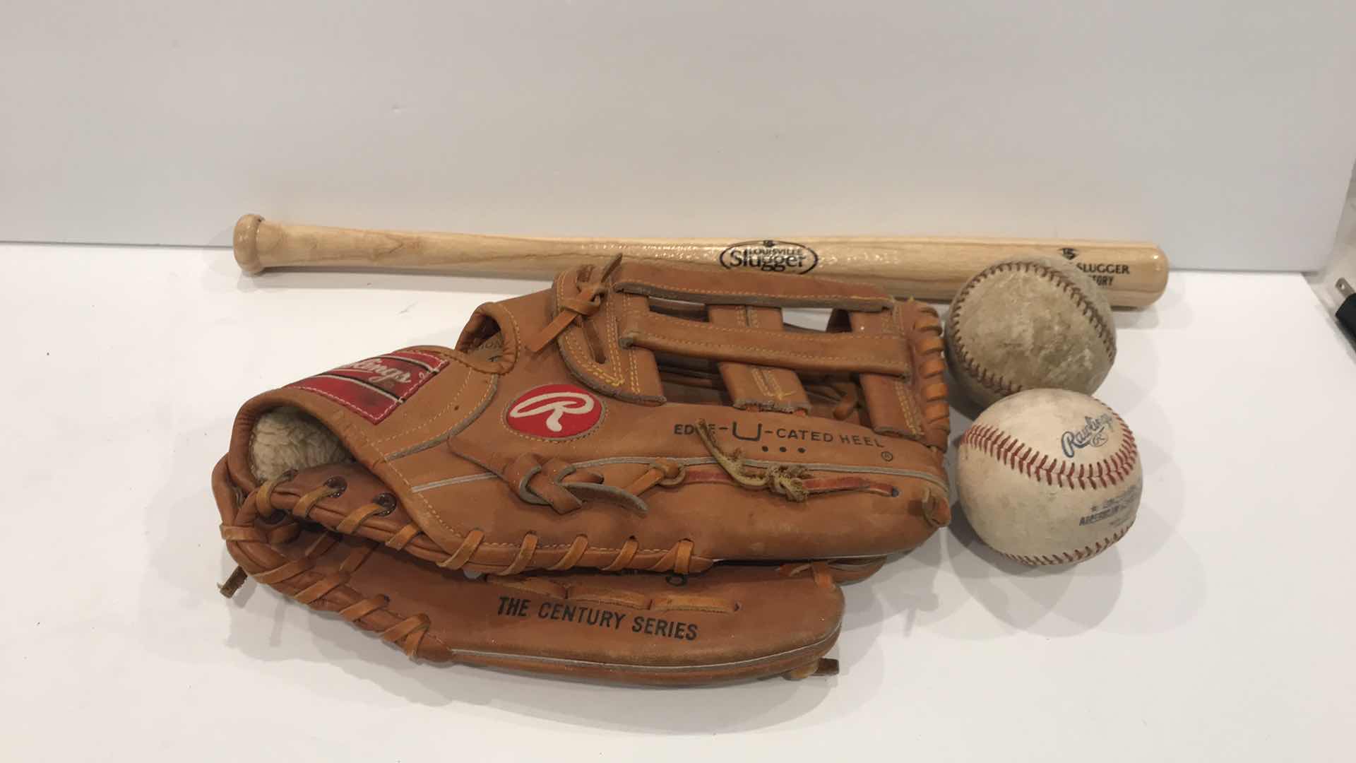 Photo 1 of BASEBALL GLOVE , MINI SLUGGERS BAT AND MORE 