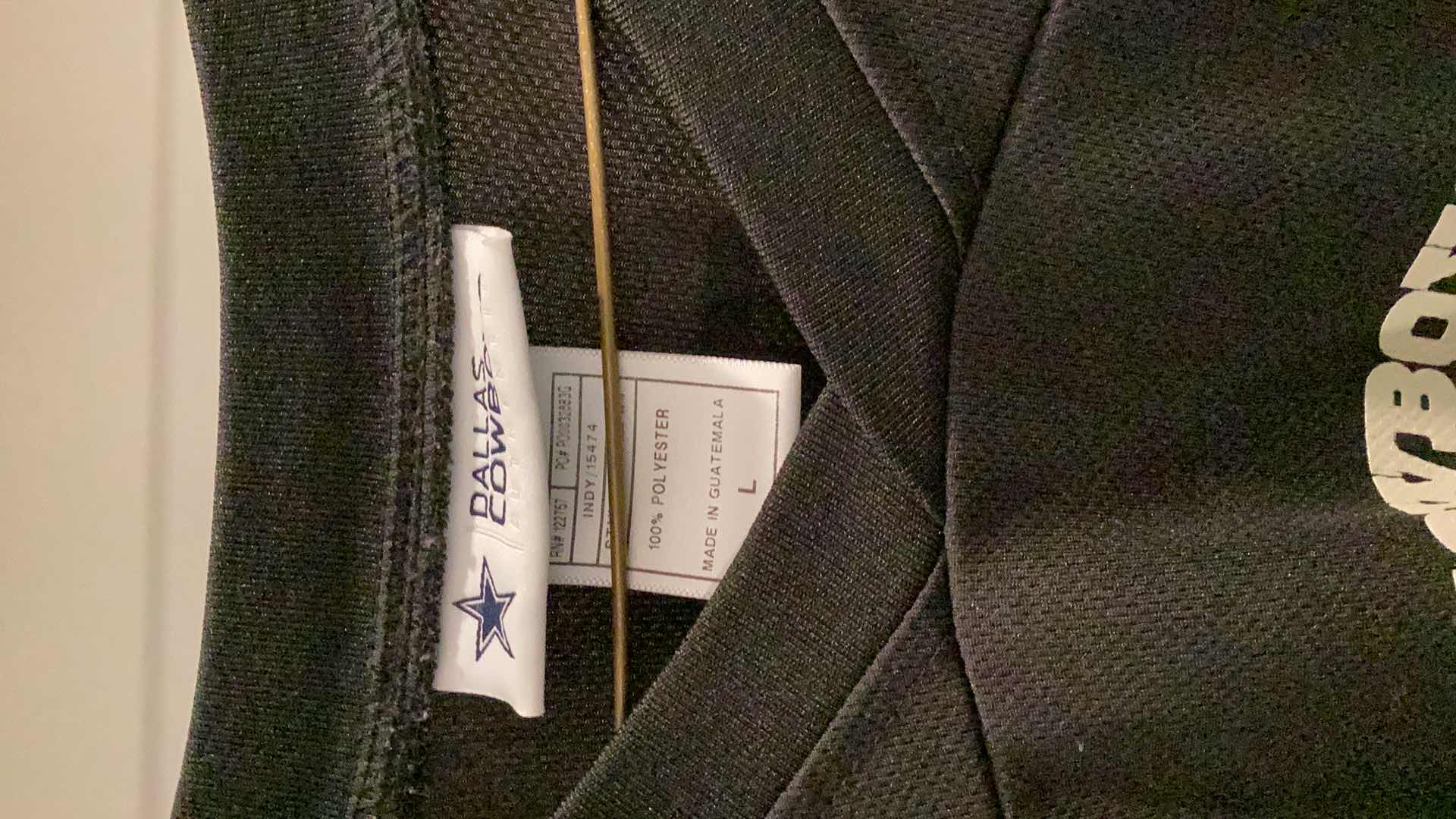 Photo 4 of DALLAS COWBOYS JERSEY WITH COOPER 19 AND A DALLAS COWBOYS TEE SHIRT. SIZES ARE M AND LARGE.