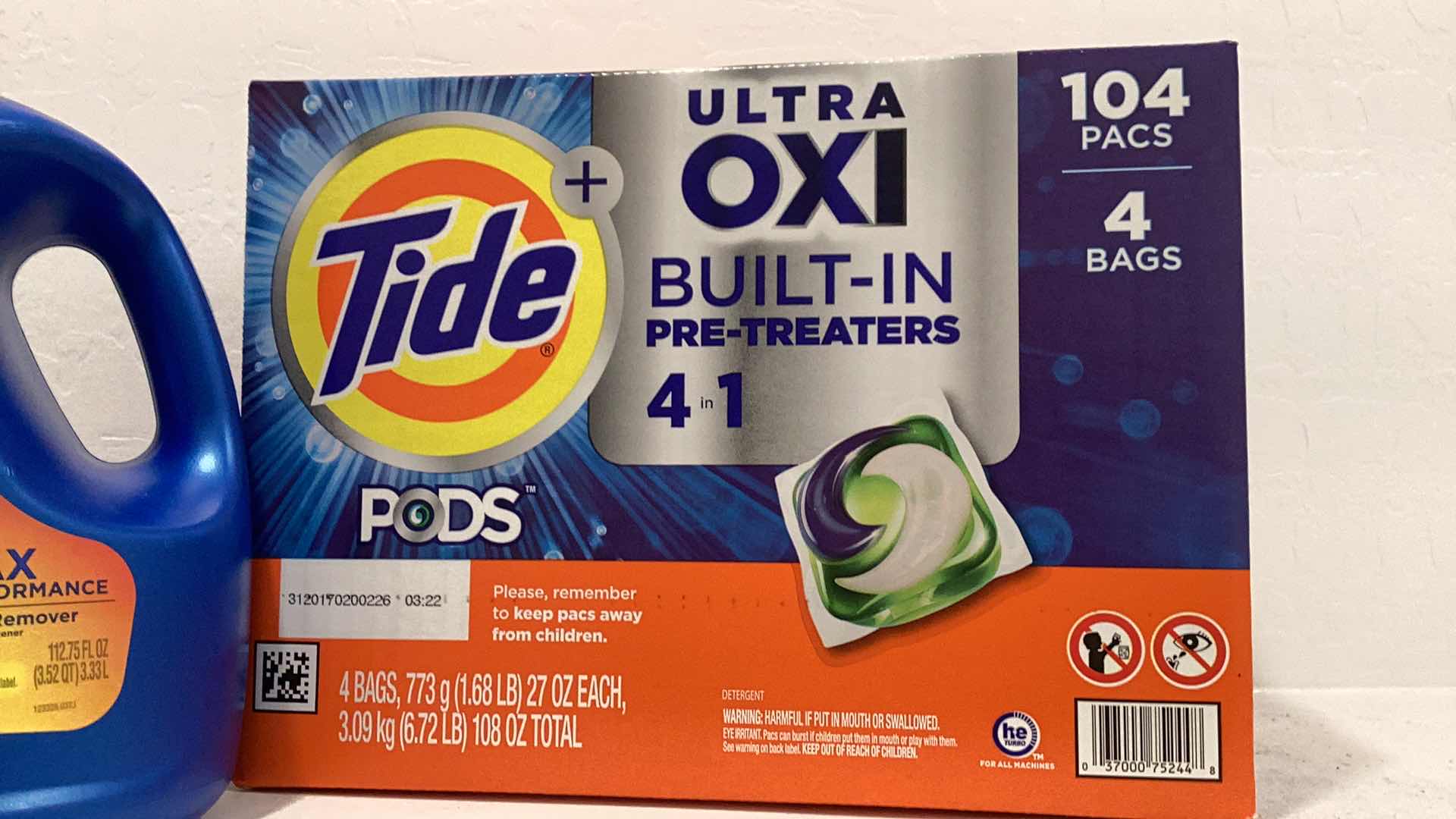 Photo 1 of CLOROX LAUNDRY DETERGENT LASTING FOR 82 LOADS AND TIDE PODS WITH 104 PACKS.