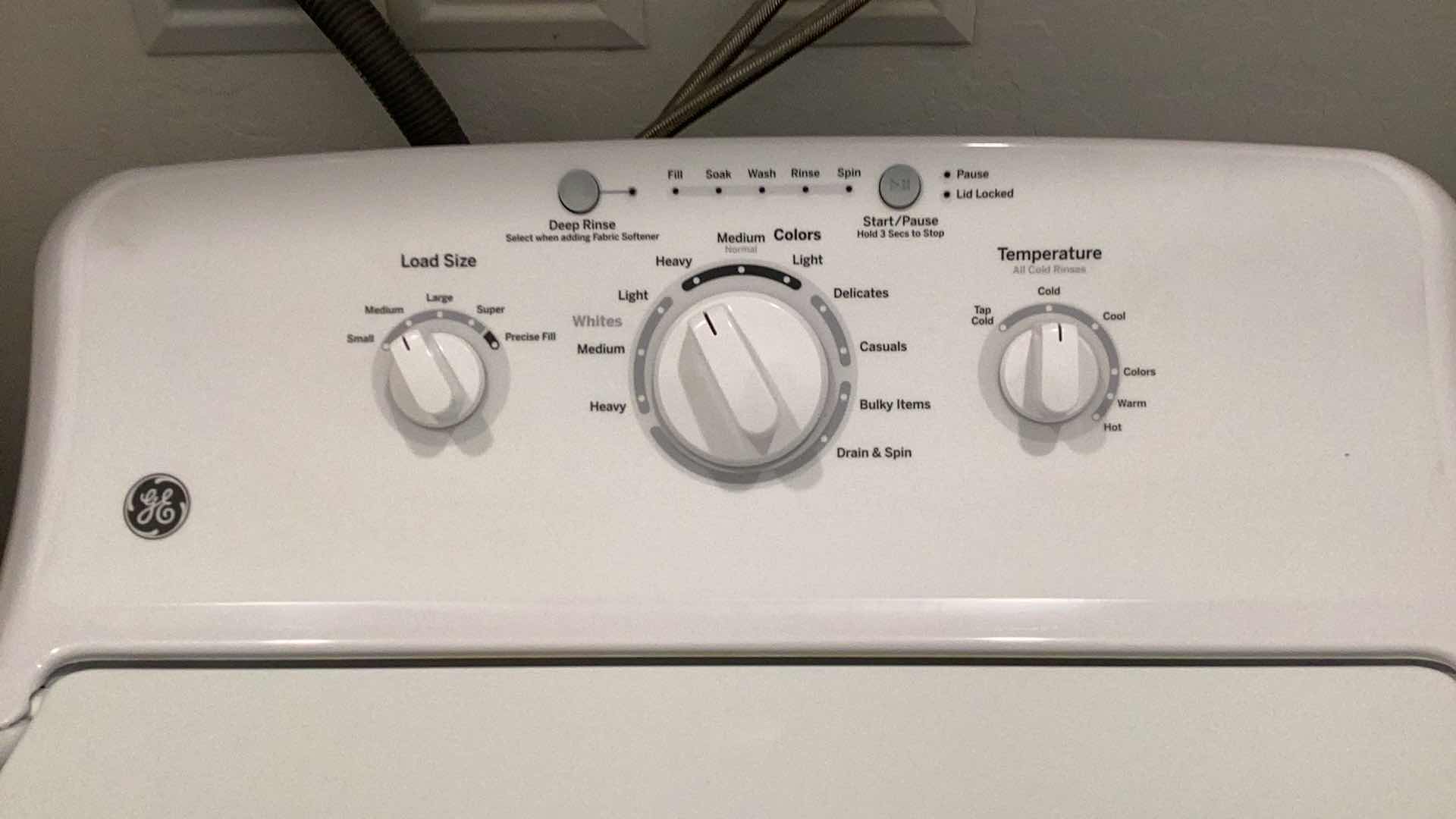 Photo 1 of GE 3.8 CU. FT. CAPACITY STAINLESS STEEL BASKET WASHING MACHINE.
