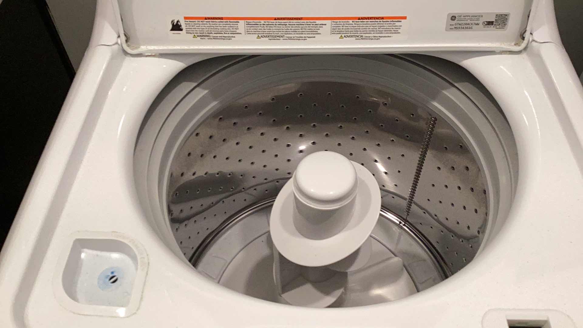 Photo 1 of GE 3.8 CU. FT. CAPACITY STAINLESS STEEL BASKET WASHING MACHINE.

