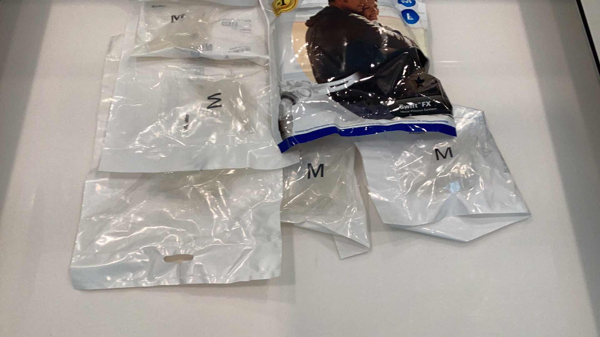 Photo 1 of RESMED SWIFT FX NASAL PILLOWS SYSTEM COMPACT AND LIGHT WEIGHT DESIGN, DUAL WALL NASAL PILLOWS PROVIDE YOU WITH A SOFT SECURE SEAL, TWO POINT HEADGEAR WITH SOFT WRAPS, SPRING FLEX TUBING WITH A SWIVEL, SIMPLE AND EASY TO MAINTAIN, AND ULTRA QUITE. WITH EXT