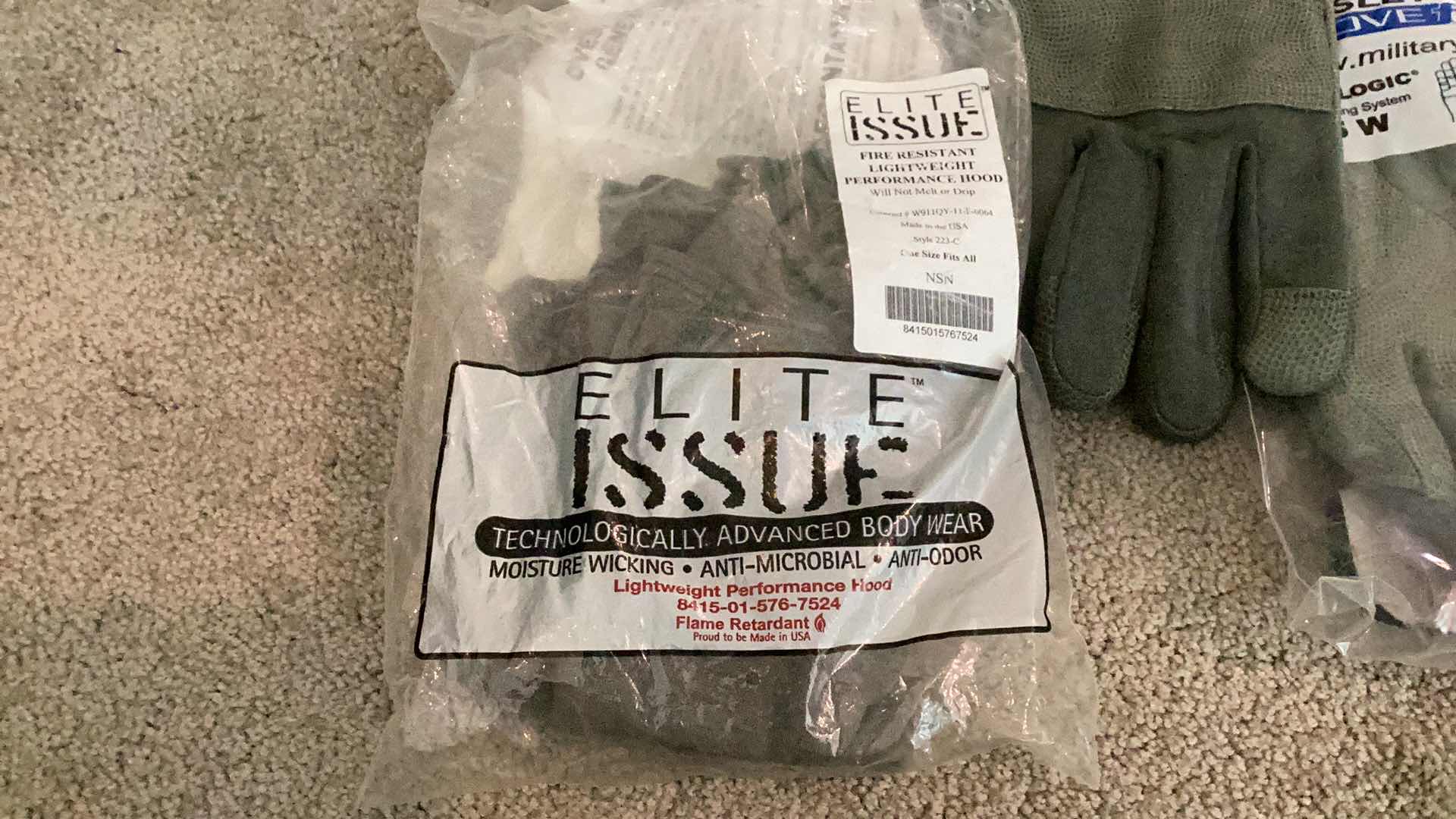 Photo 1 of MILITARY AUTHENTIC GRADE GLOVES AND HOOD.