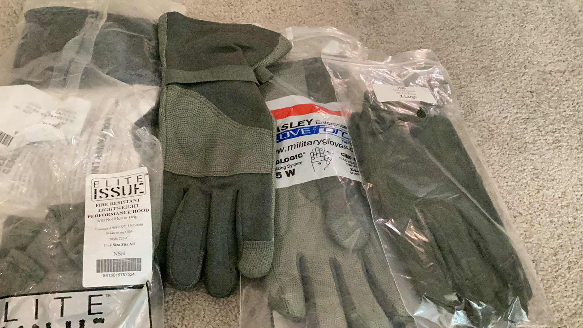 Photo 1 of MILITARY AUTHENTIC GRADE GLOVES AND HOOD.