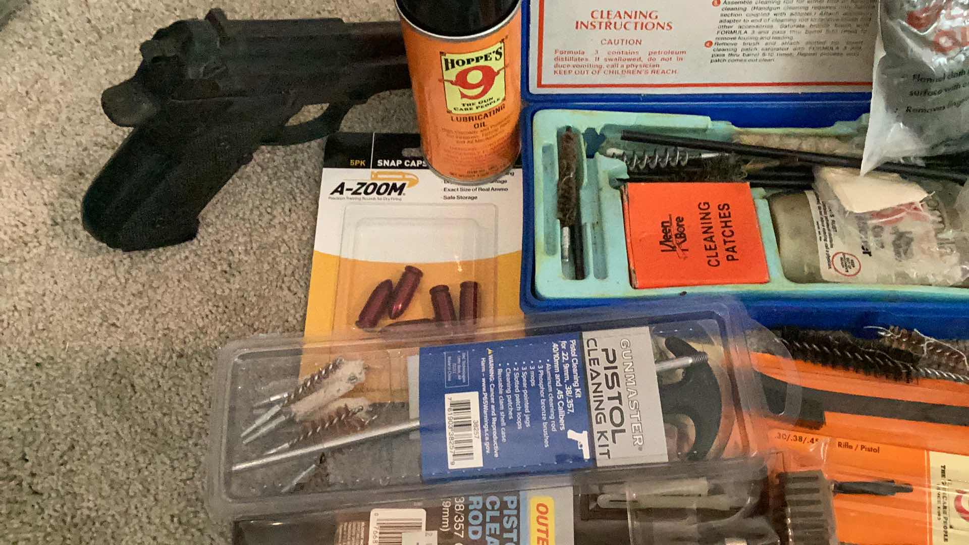 Photo 1 of MILITARY ISSUED  GUN CLEANING / MAINTENANCE TOOLS, AND RUBBER TRAINING GUN.