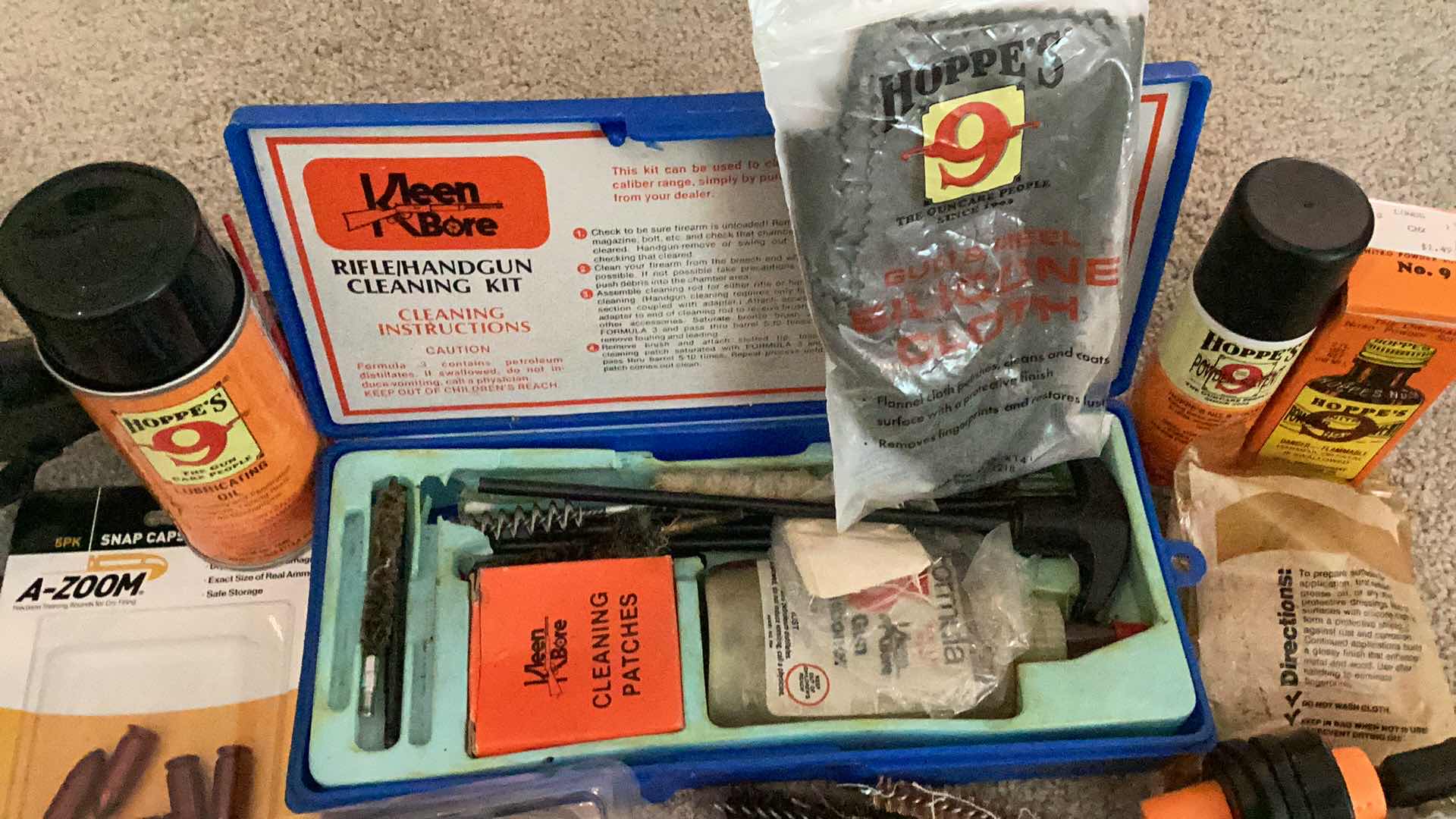 Photo 1 of MILITARY ISSUED  GUN CLEANING / MAINTENANCE TOOLS, AND RUBBER TRAINING GUN.