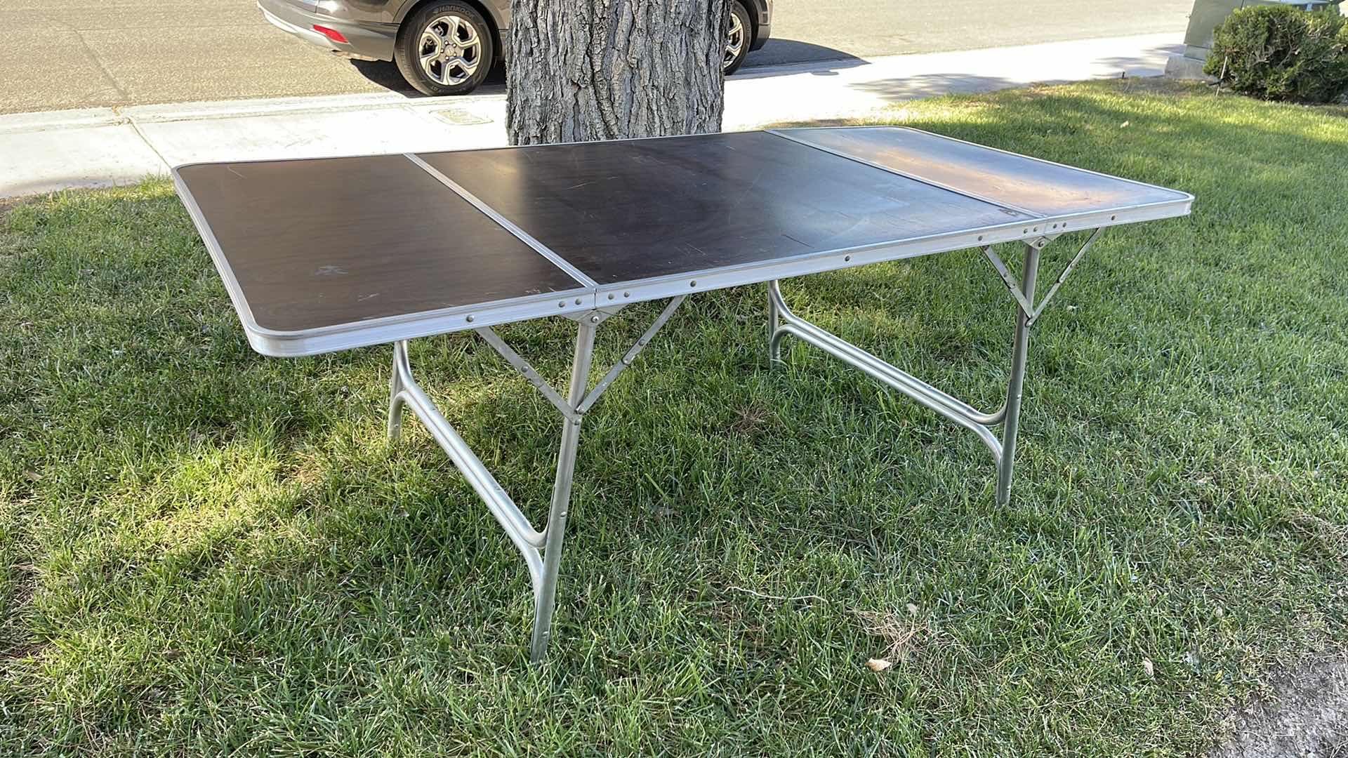 Photo 1 of VINTAGE PORTABLE FOLDING TABLE