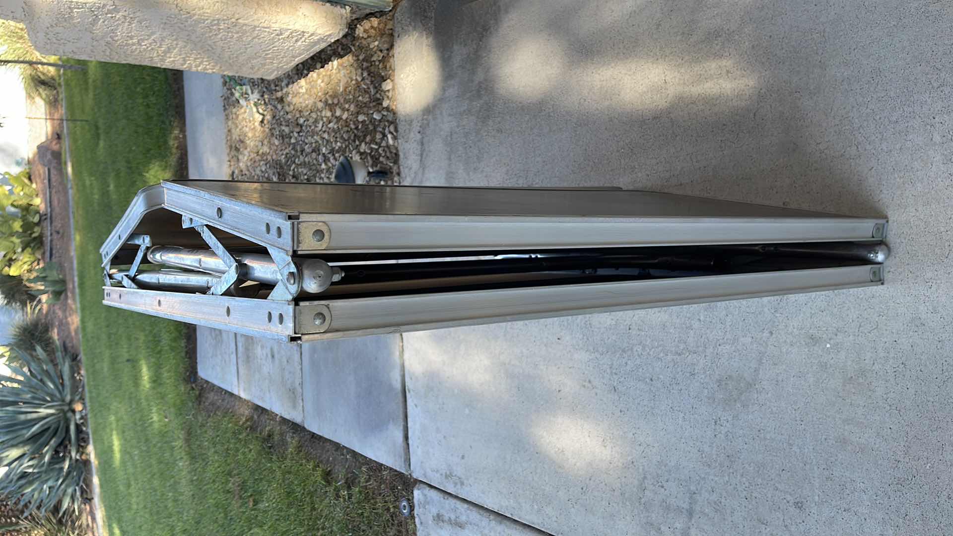 Photo 1 of VINTAGE PORTABLE FOLDING TABLE