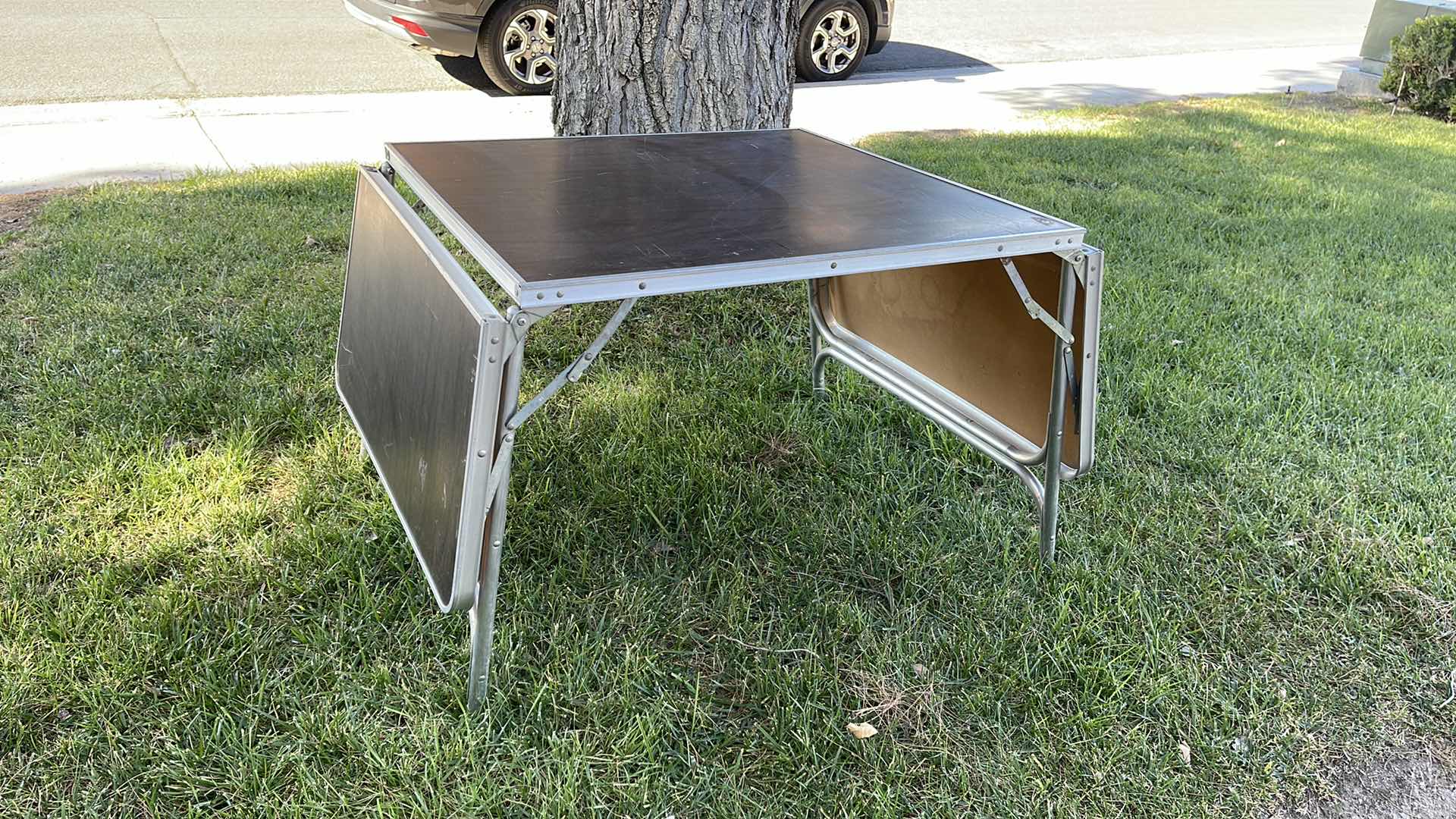 Photo 1 of VINTAGE PORTABLE FOLDING TABLE