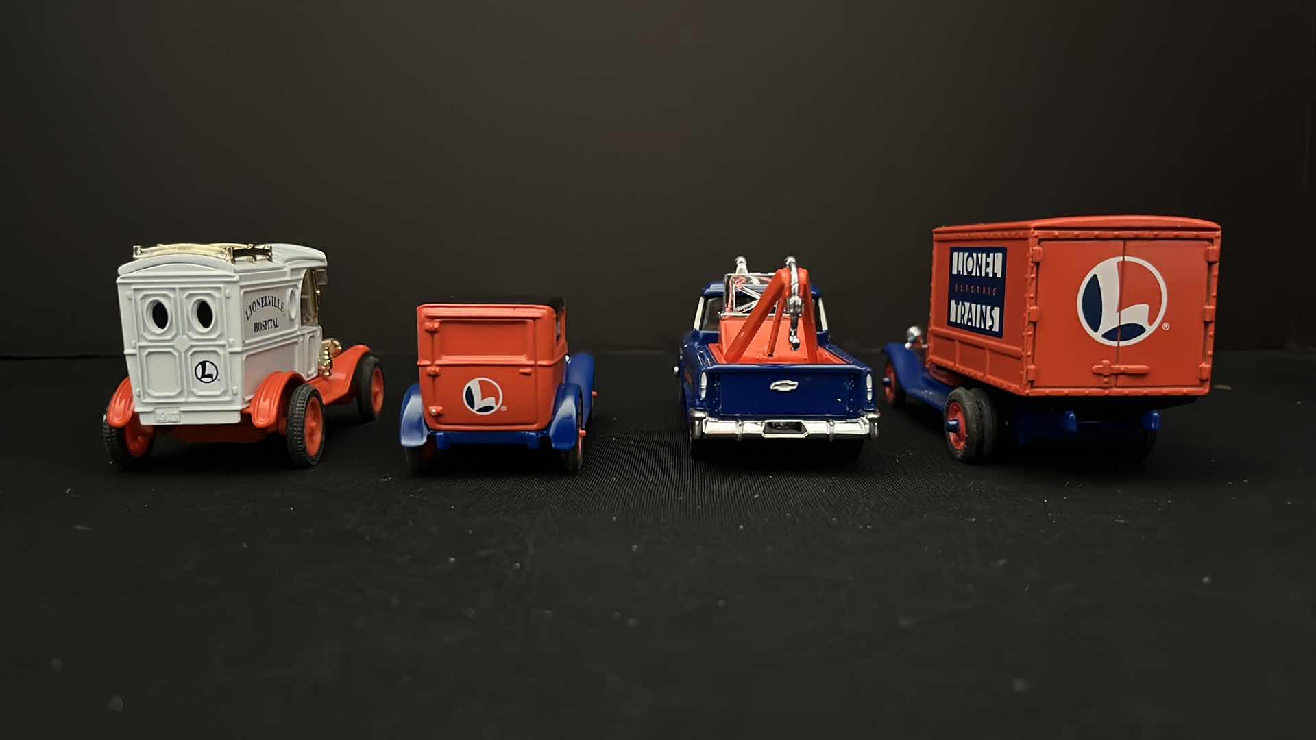 Photo 1 of ERTL COLLECTIBLES, EASTWOOD AUTOMOBILIA TRANSPORTATION COLLECTIBLES LIONEL ELECTRIC TRAINS DIE CAST VEHICLES (4) STOCK NO 3522 & B518