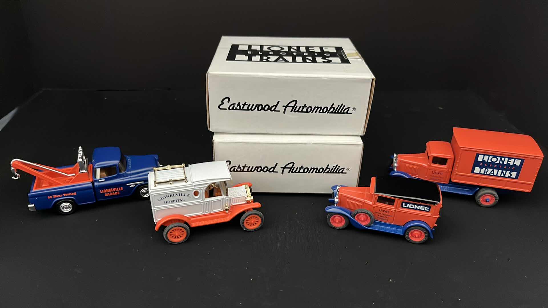 Photo 1 of ERTL COLLECTIBLES, EASTWOOD AUTOMOBILIA TRANSPORTATION COLLECTIBLES LIONEL ELECTRIC TRAINS DIE CAST VEHICLES (4) STOCK NO 3522 & B518