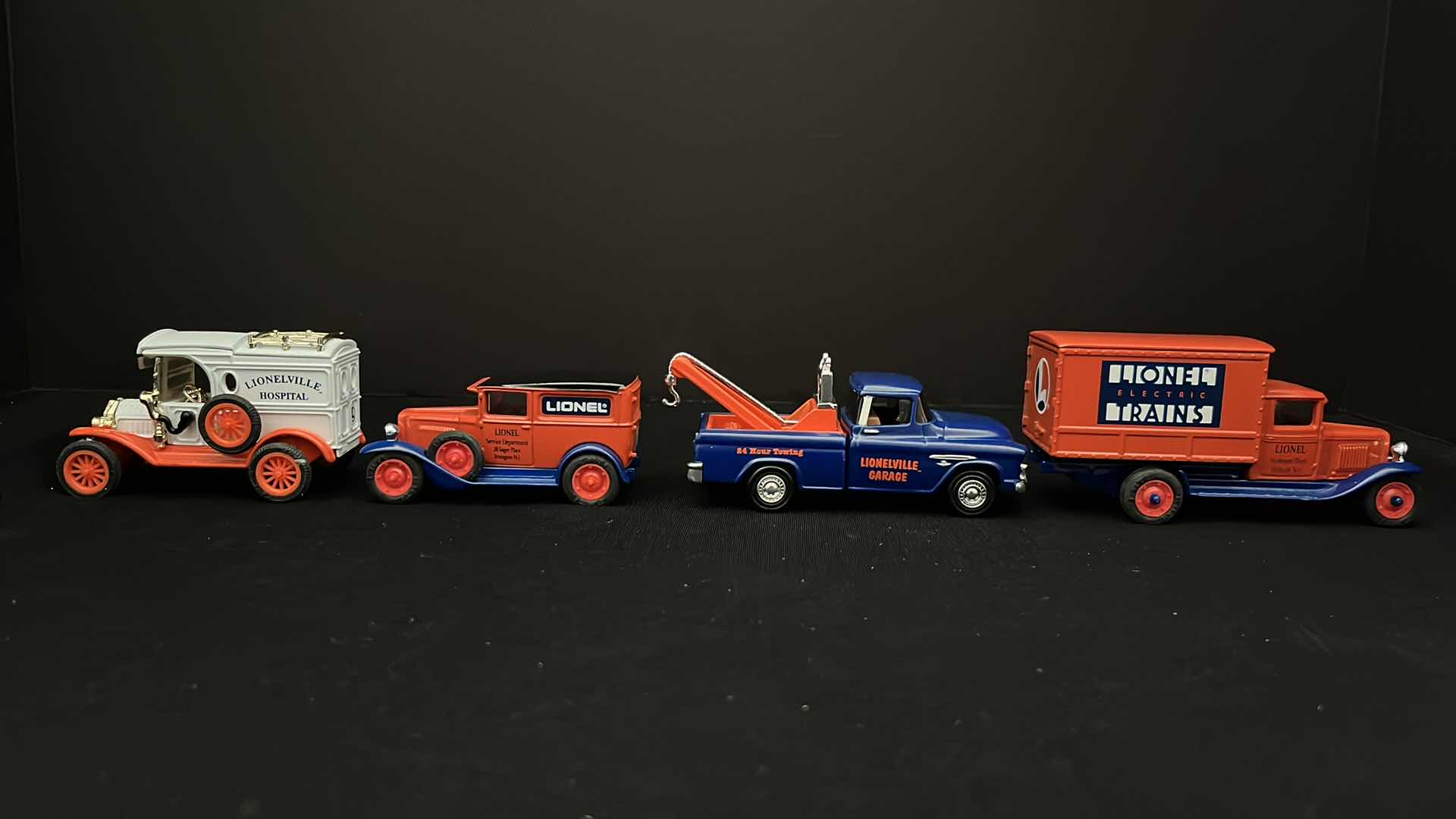 Photo 1 of ERTL COLLECTIBLES, EASTWOOD AUTOMOBILIA TRANSPORTATION COLLECTIBLES LIONEL ELECTRIC TRAINS DIE CAST VEHICLES (4) STOCK NO 3522 & B518