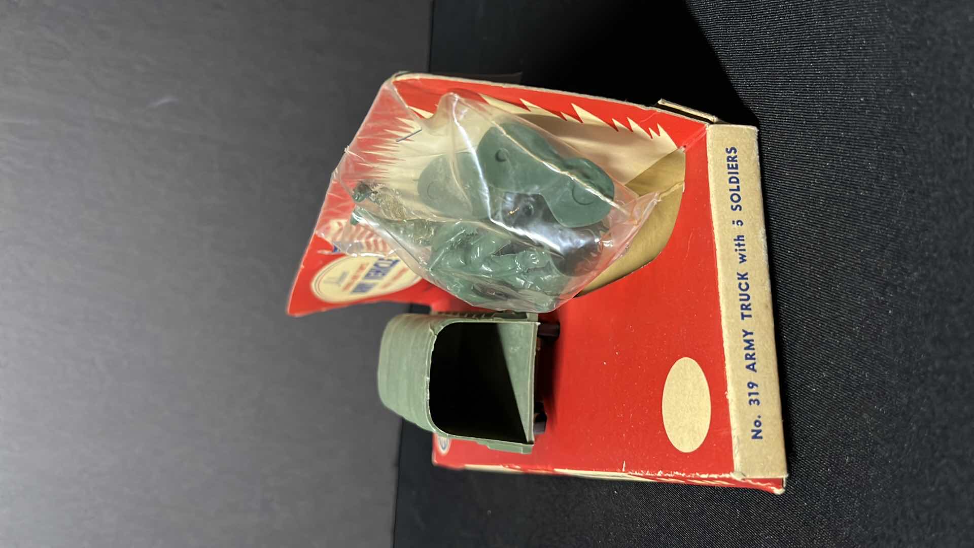 Photo 1 of AUBURN TOYS RUBBER-LIKE VINYL ARMY VEHICLE W SOLDIERS (No. 319 ARMY TRUCK W 5 SOLDIERS)