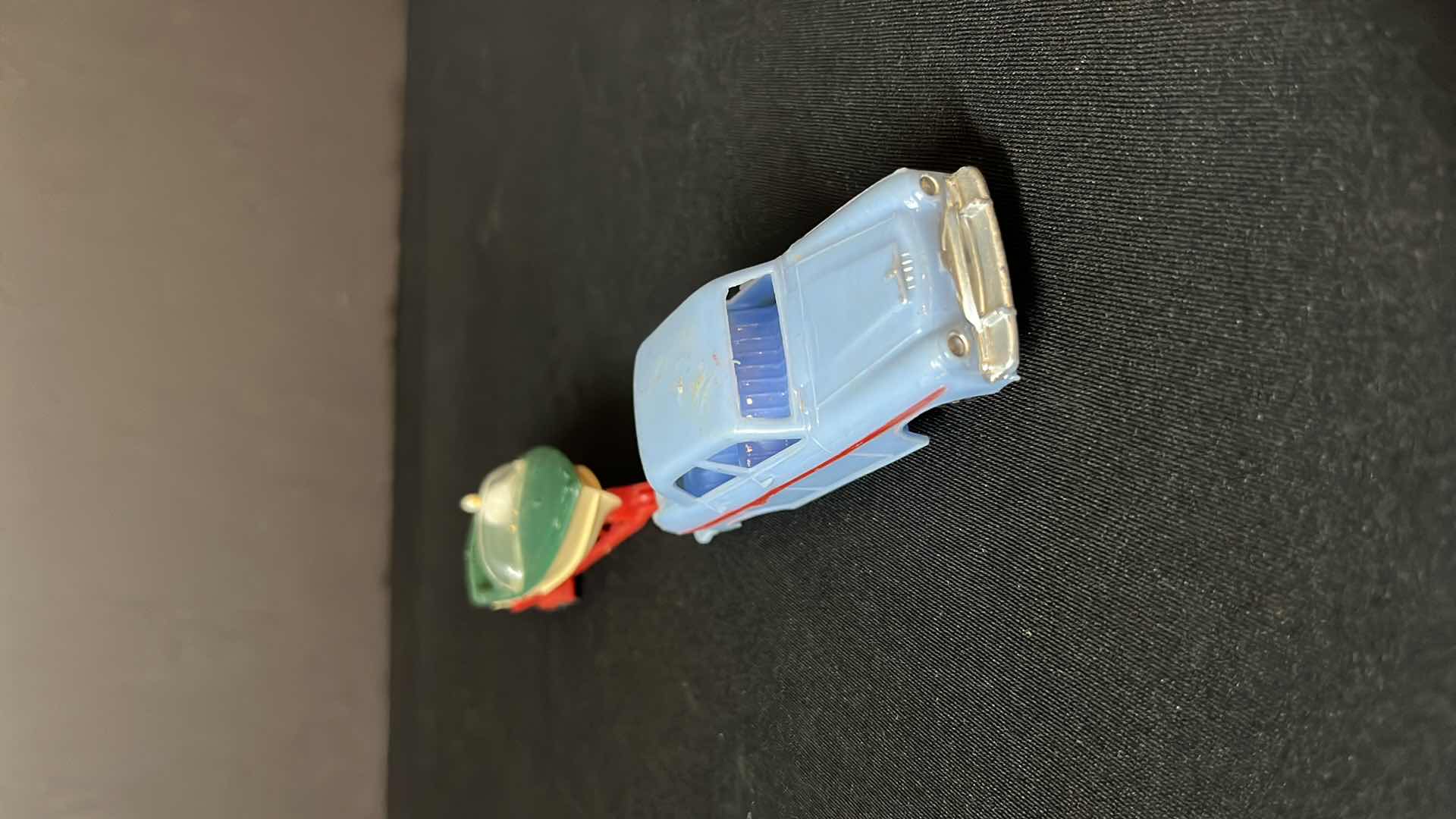 Photo 1 of A BLUE BOX PLASTIC TOY SERIES CAR AND BOAT TRAILER SET, FOR THE VACATIONER