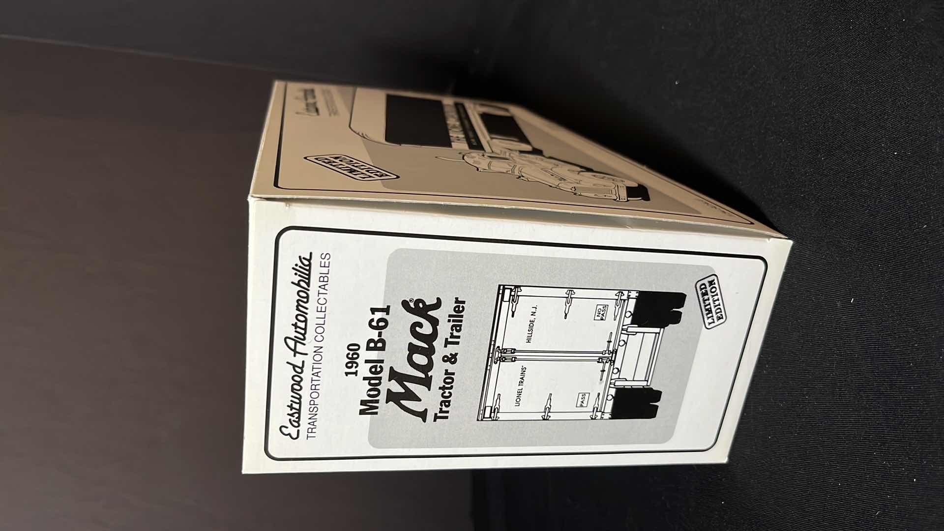 Photo 1 of FIRST GEAR EASTWOOD AUTOMOBILIA TRANSPORTATION COLLECTABLES 1960 MODEL B-61 LIONEL TRAINS MACK TRAILER & TRACTOR (STOCK NO 19-0116)