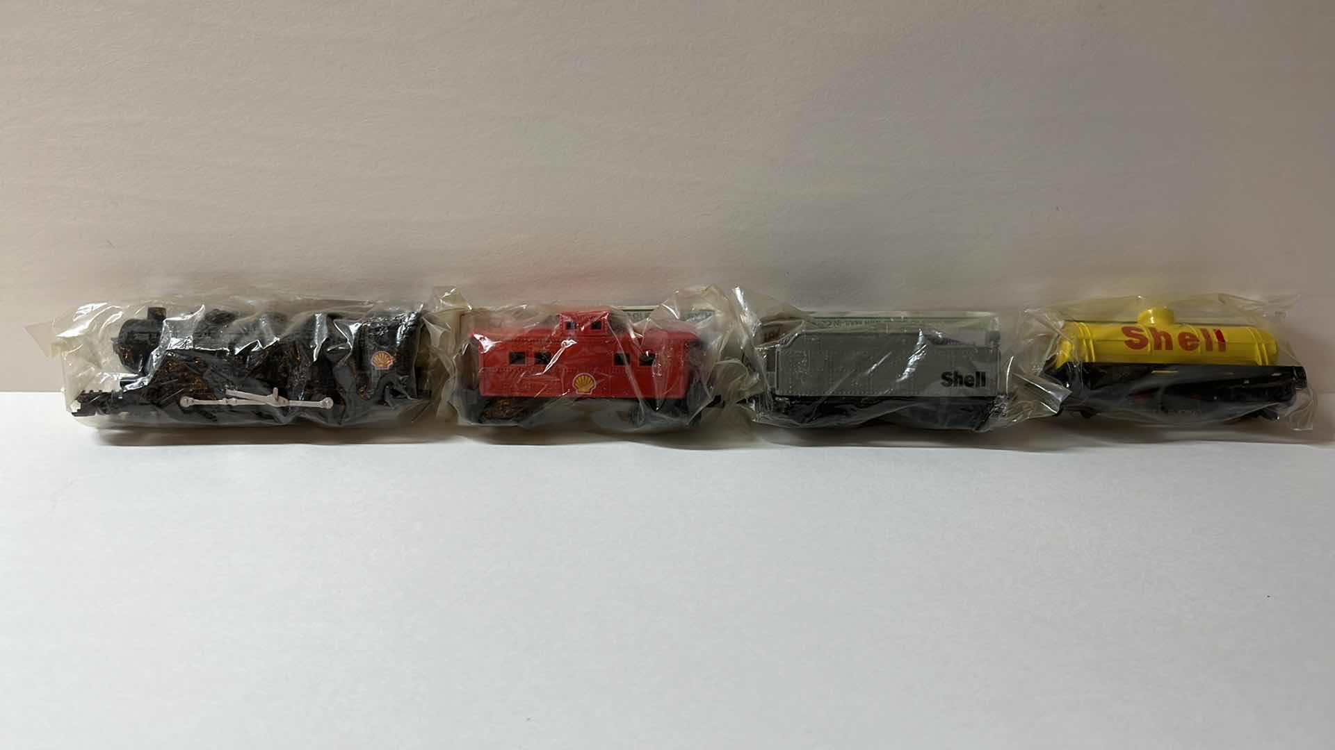 View 1 of FLETCHER-BARNHARDT & WHITE INC SHELL GAS TRAIN SET, 19.5” X H2”