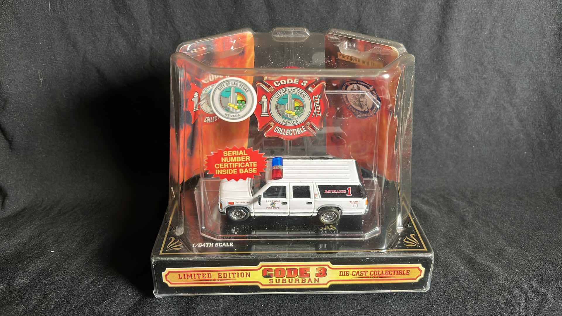 View 1 of CODE 3 COLLECTIBLES 1:64 DIE-CAST METAL 1998 GMC SUBURBAN CITY OF LAS VEGAS NEVADA FIRE DEPT (#12407)