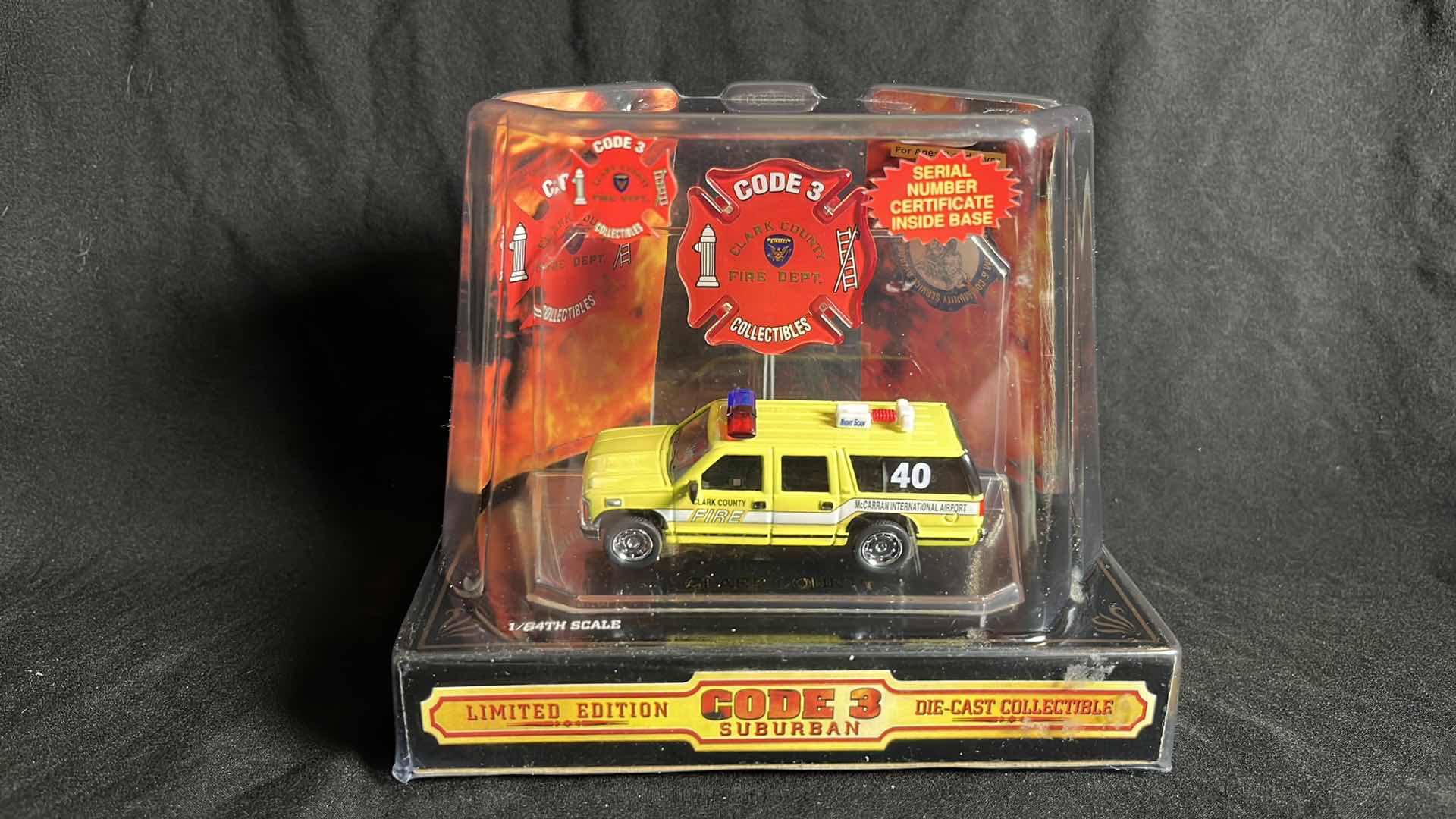 View 1 of CODE 3 COLLECTIBLES 1:64 DIE-CAST METAL 1999 GMC SUBURBAN CLARK COUNTY FIRE DEPT (#12360)