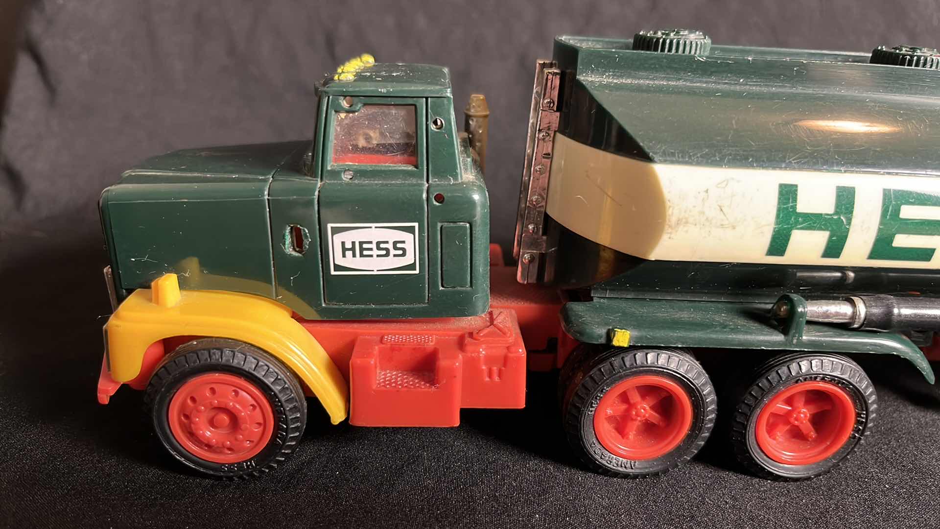 Photo 1 of 1984 HESS BATTERY OPERATED TANKER TRUCK BANK (H1984), TRACTOR IS MISSING PLASTIC CHROME PIECES, NO BOX