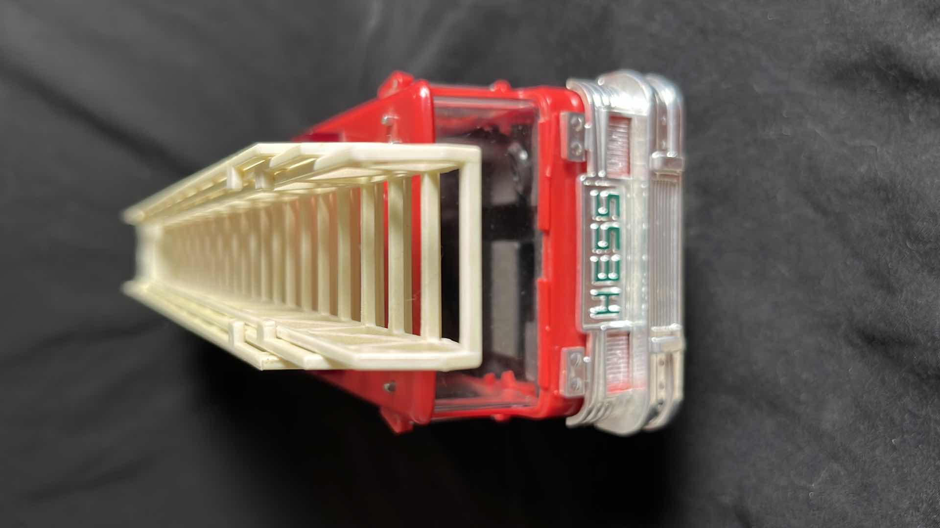 Photo 1 of HESS RED FIRE TRUCK BANK W AERIAL LADDER & ENGINE, BATTERY OPERATED, 1986, NO BOX