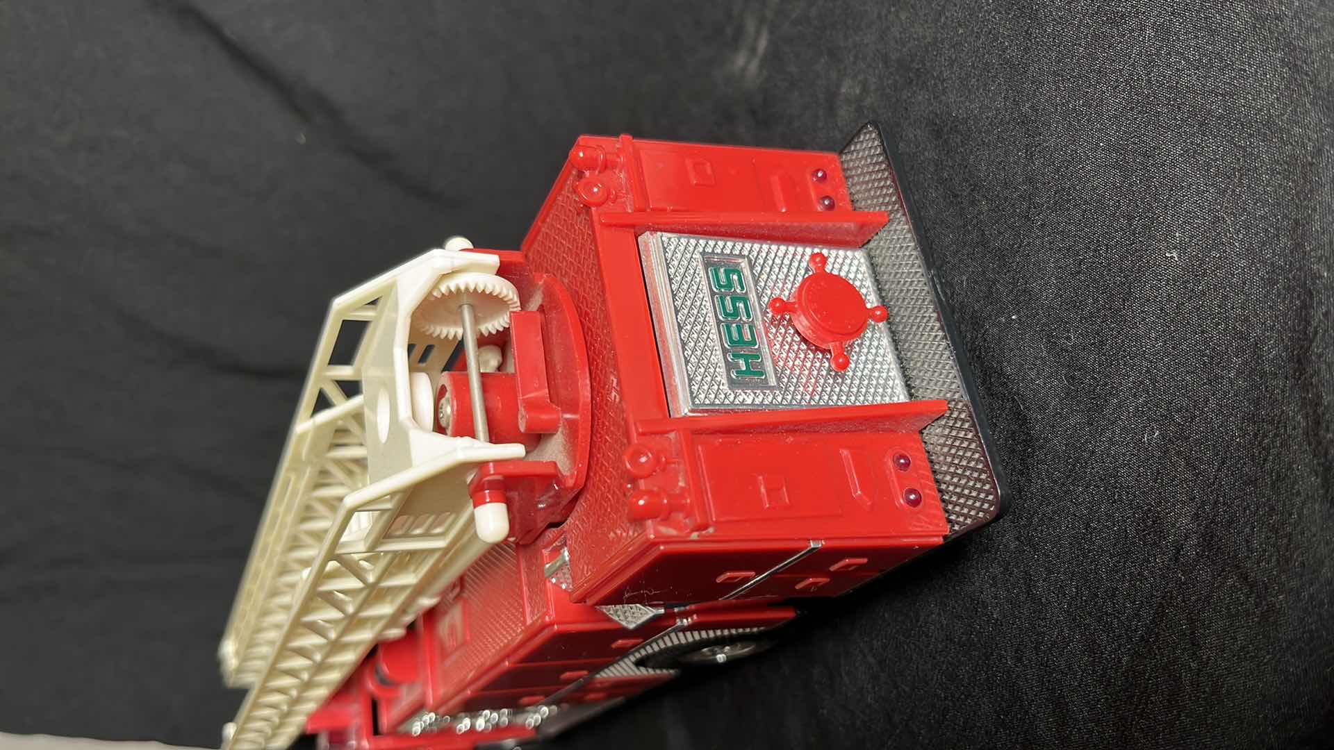 Photo 1 of HESS RED FIRE TRUCK BANK W AERIAL LADDER & ENGINE, BATTERY OPERATED, 1986, NO BOX