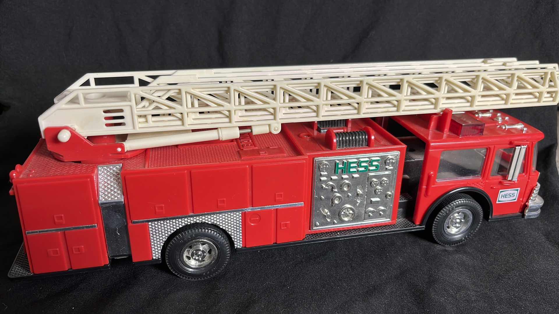 Photo 1 of HESS RED FIRE TRUCK BANK W AERIAL LADDER & ENGINE, BATTERY OPERATED, 1986, NO BOX